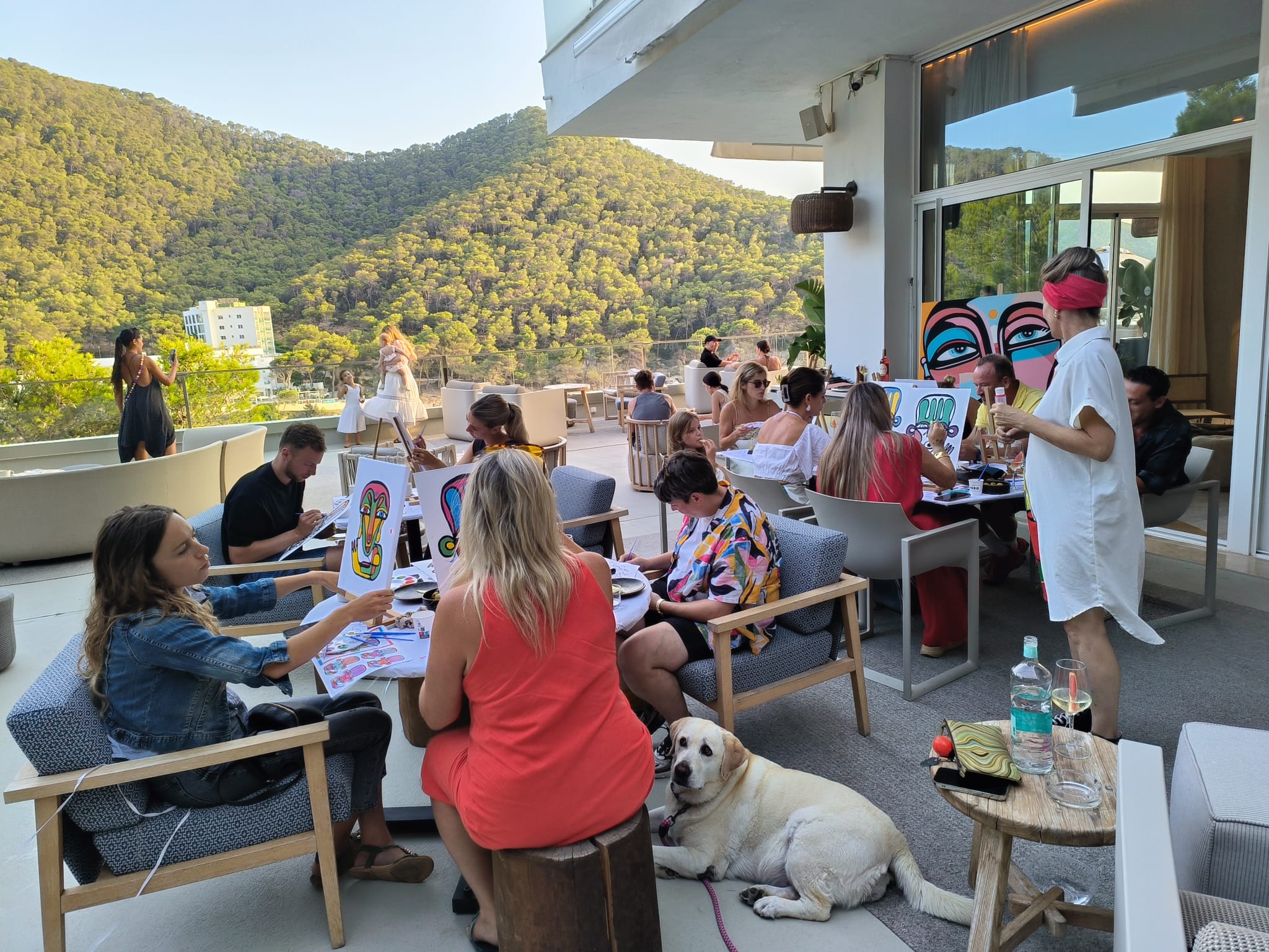 Wellness activities, such as group painting classes, have risen in popularity in Ibiza