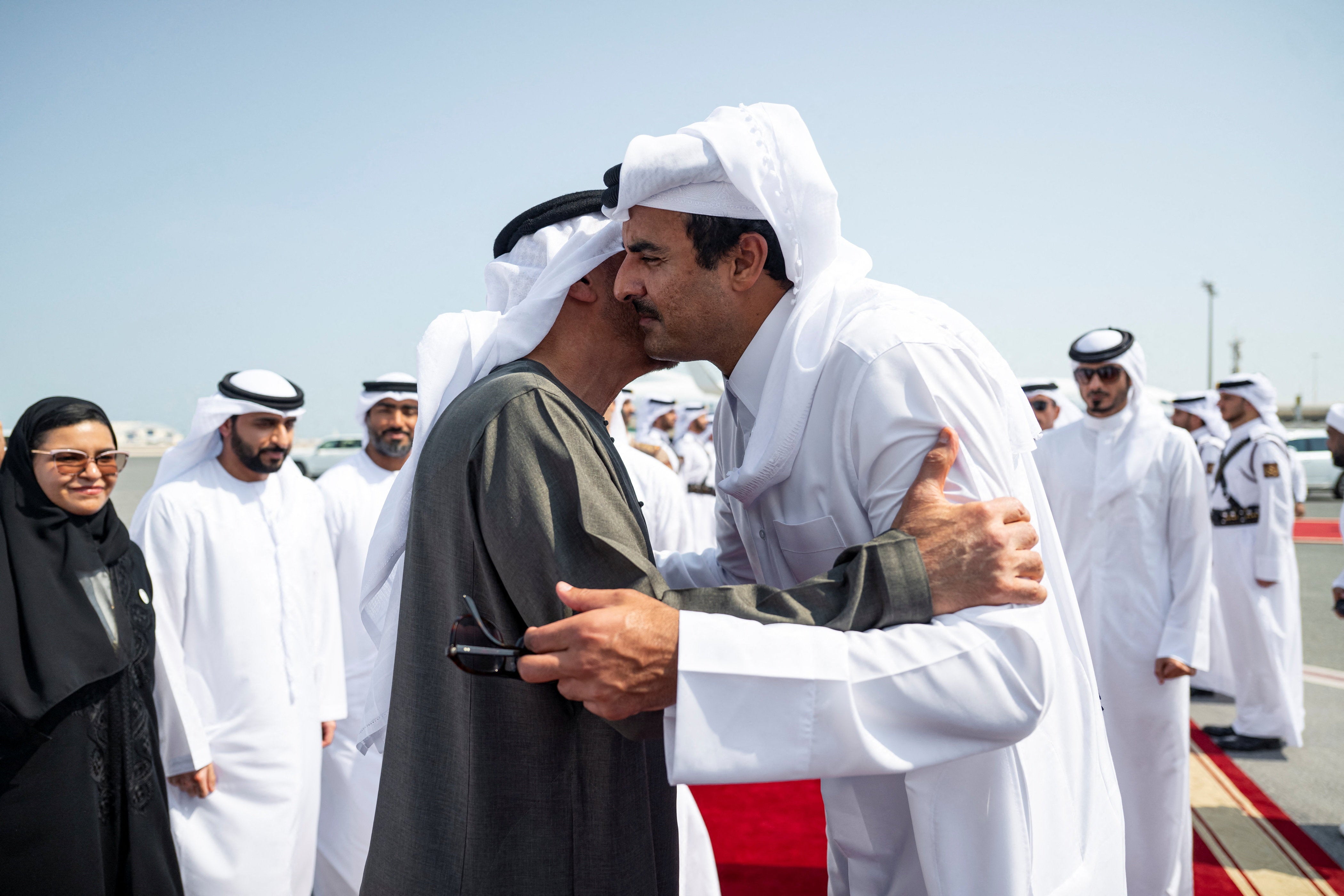Sheikh Mohamed bin Zayed al-Nahyan, president of the United Arab Emirates, is greeted by Sheikh Tamim bin Hamad al-Thani, the emir of Qatar, in Doha