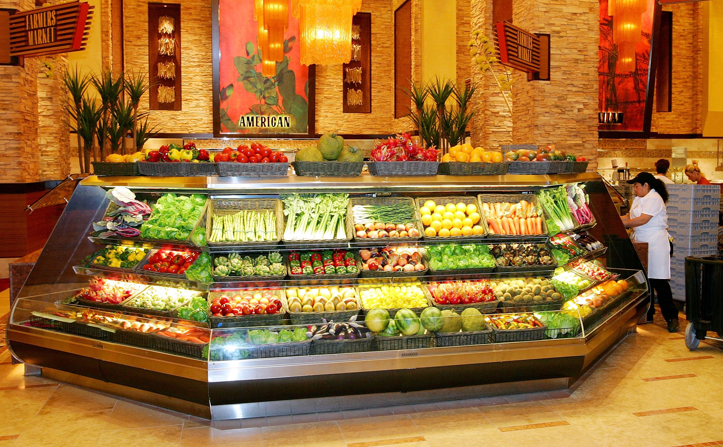 Workers get the Feast Buffet restaurant ready for opening at the Red Rock Casino