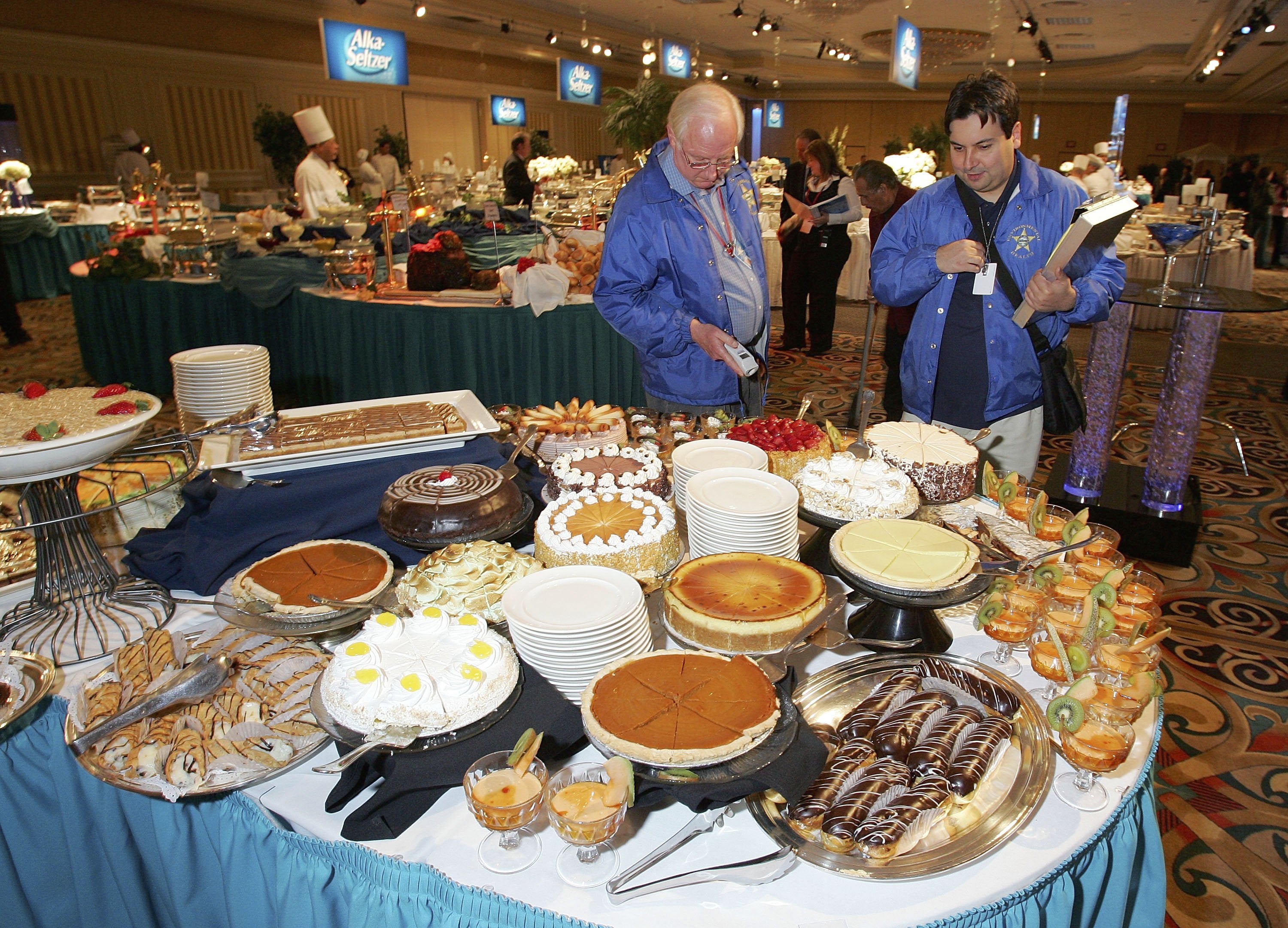 Southern Nevada Health District environmental health supervisor Gregg Wears, left, and senior environmental health specialist Robert Urzi check items in a record-setting buffet at the Las Vegas Hilton in 2006