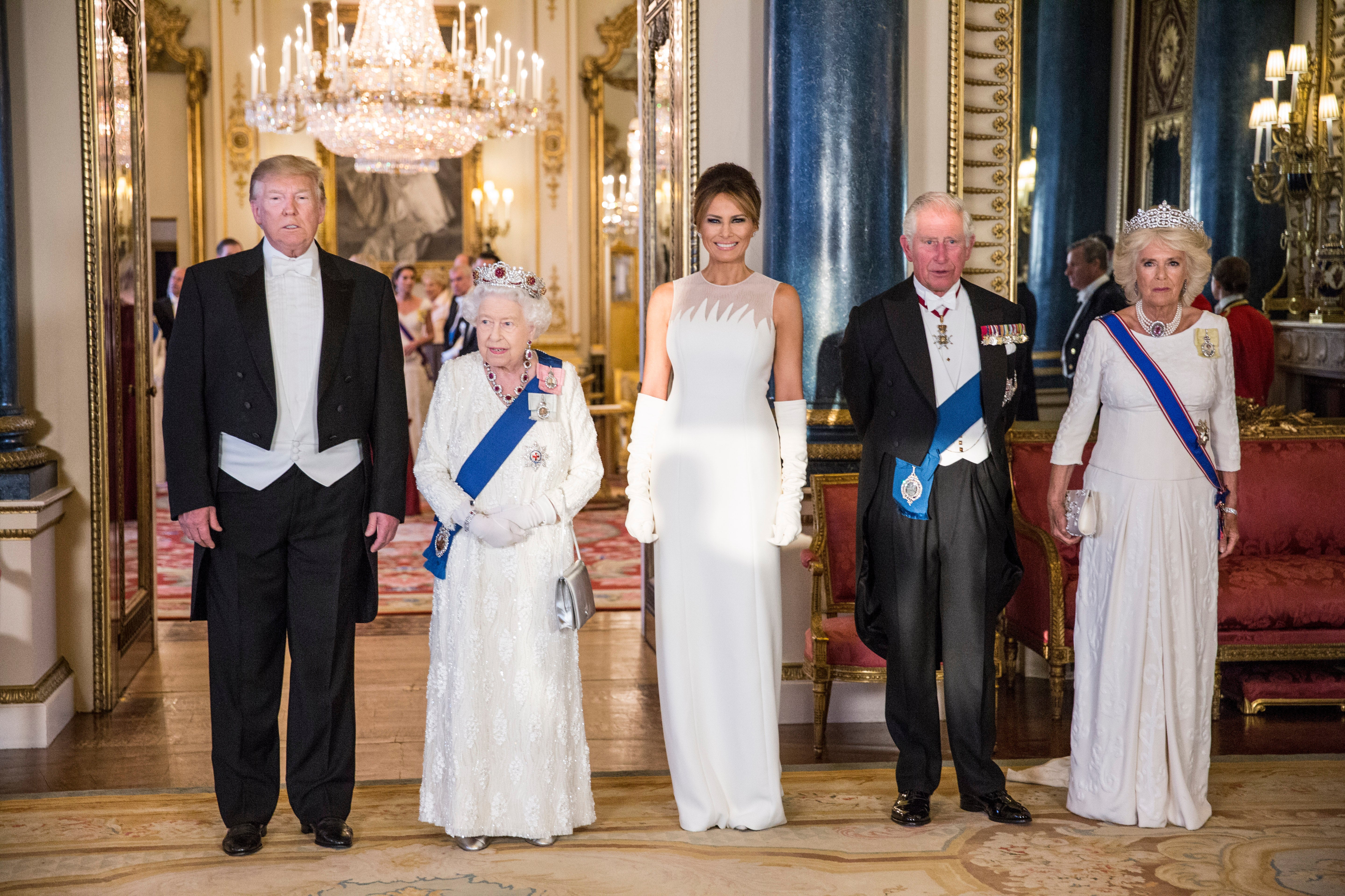 US President Donald Trump, Queen Elizabeth II, Melania Trump, the then-Prince of Wales and Duchess of Cornwall, during the 2019 state banquet