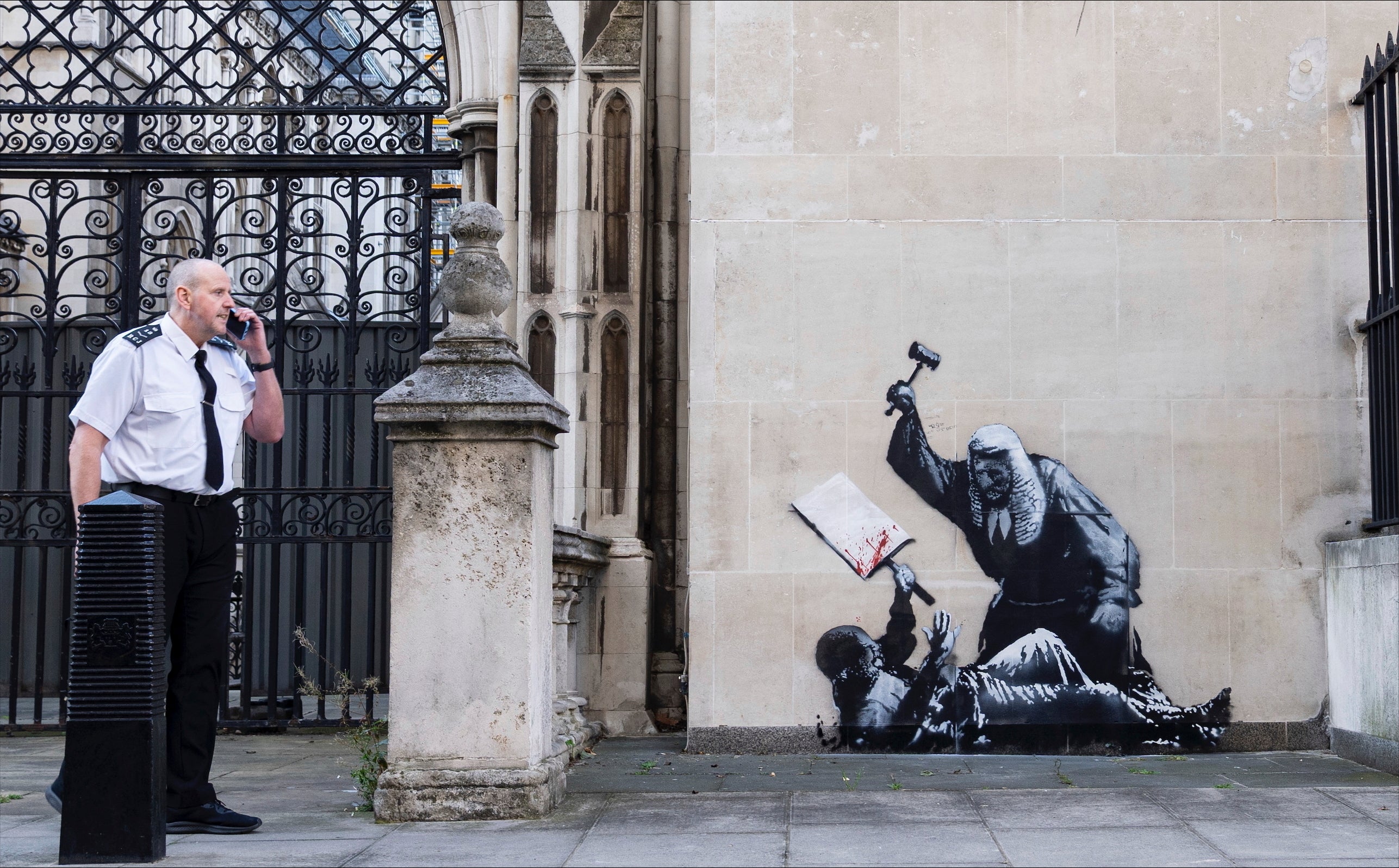 The Banksy painting, thought to allude to Palestine Action, portrays a judge beating a protester with a gavel