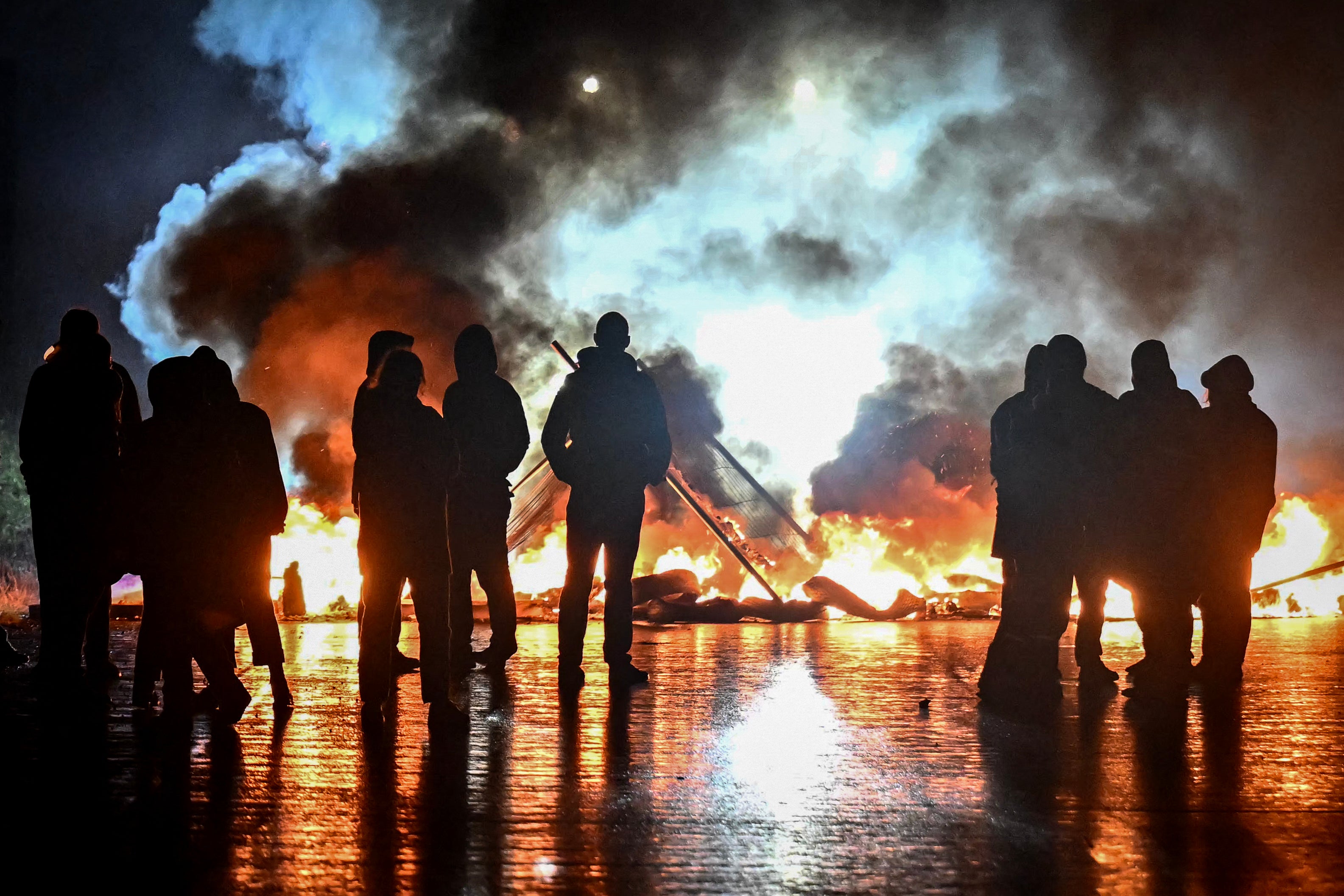 Protesters set up a fire to block the Cadix viaduct during a demonstration as part of the ‘Bloquons tout’ (’Let's block everything’) protest movement, in Caen, north-western France, on September 10, 2025