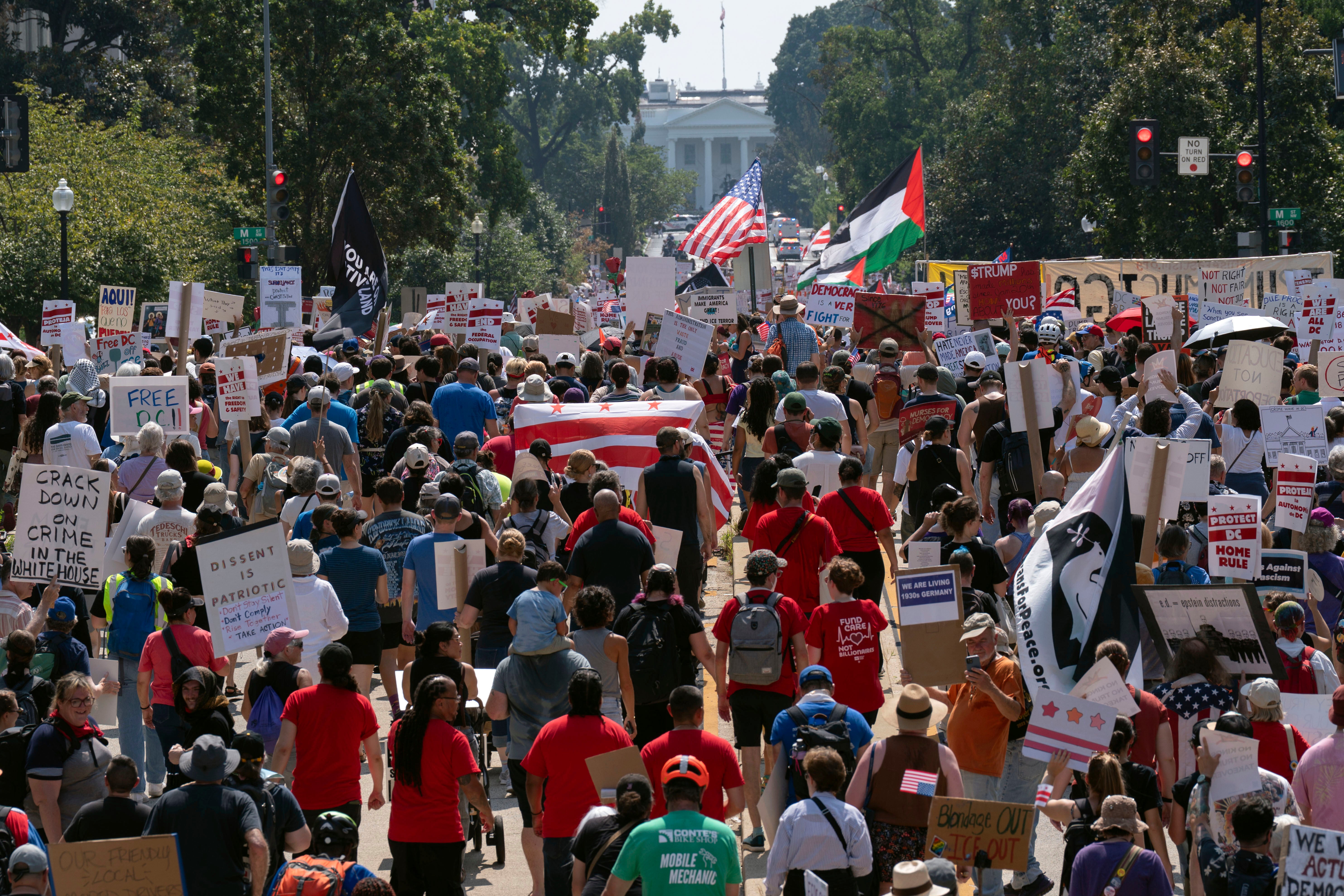 Demonstrators protest against Trump's deployment of federal law enforcement and National Guard troops in Washington