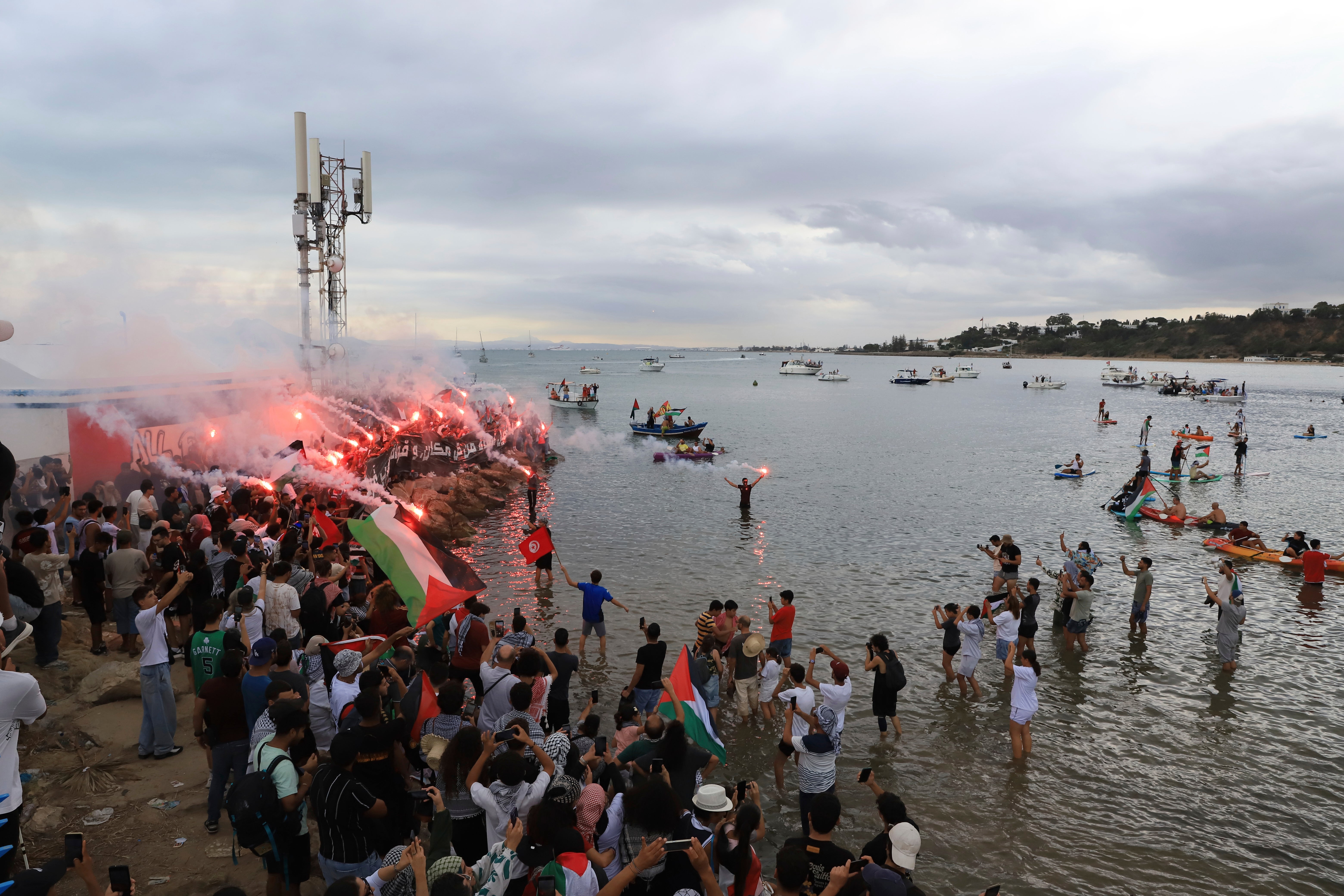 People gather to show support for the Global Sumud Flotilla ahead of its scheduled departure to deliver aid to Gaza