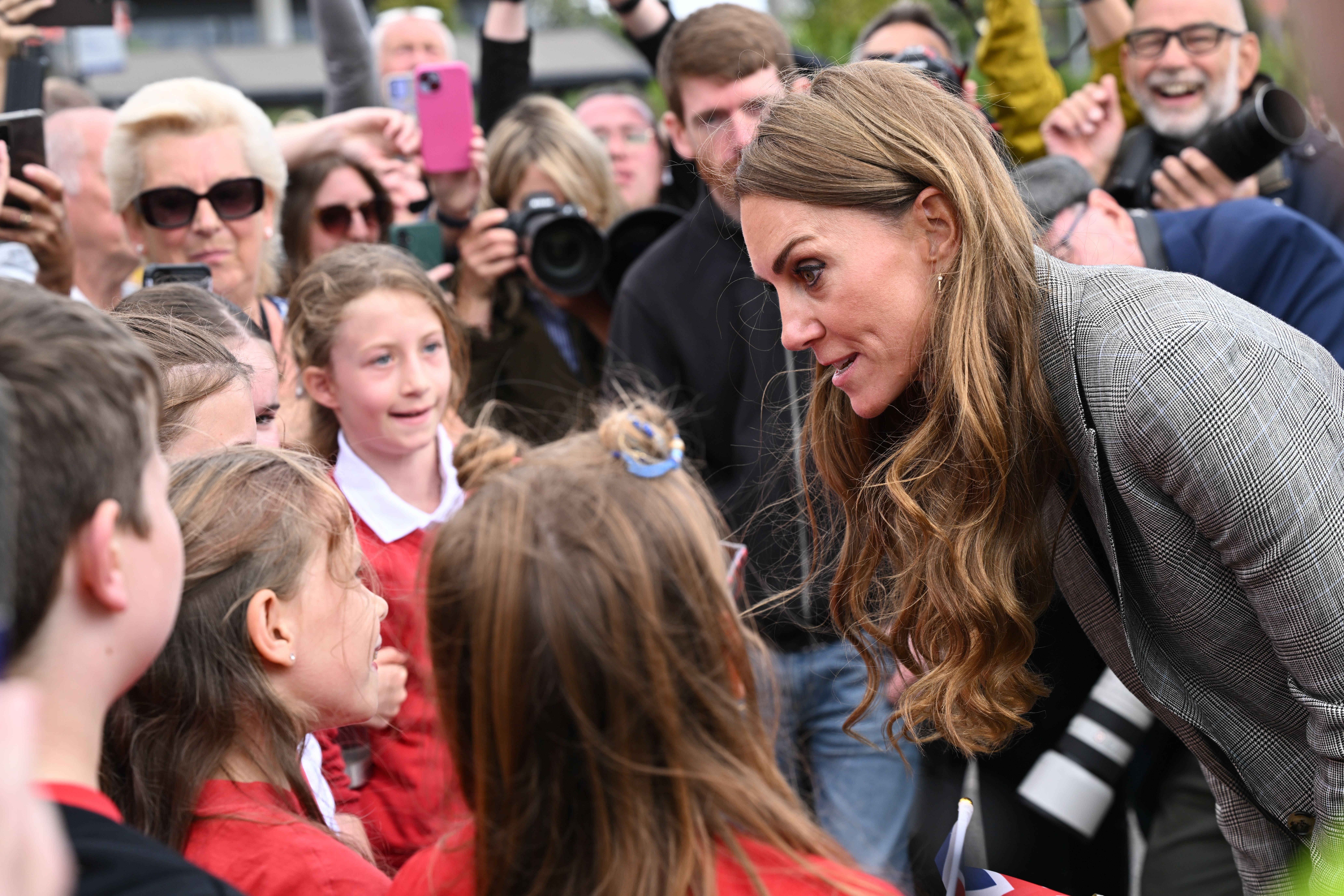 The Princess of Wales speaks to children following a visit to Sudbury Silk Mills in Sudbury (Doug Peters/PA)