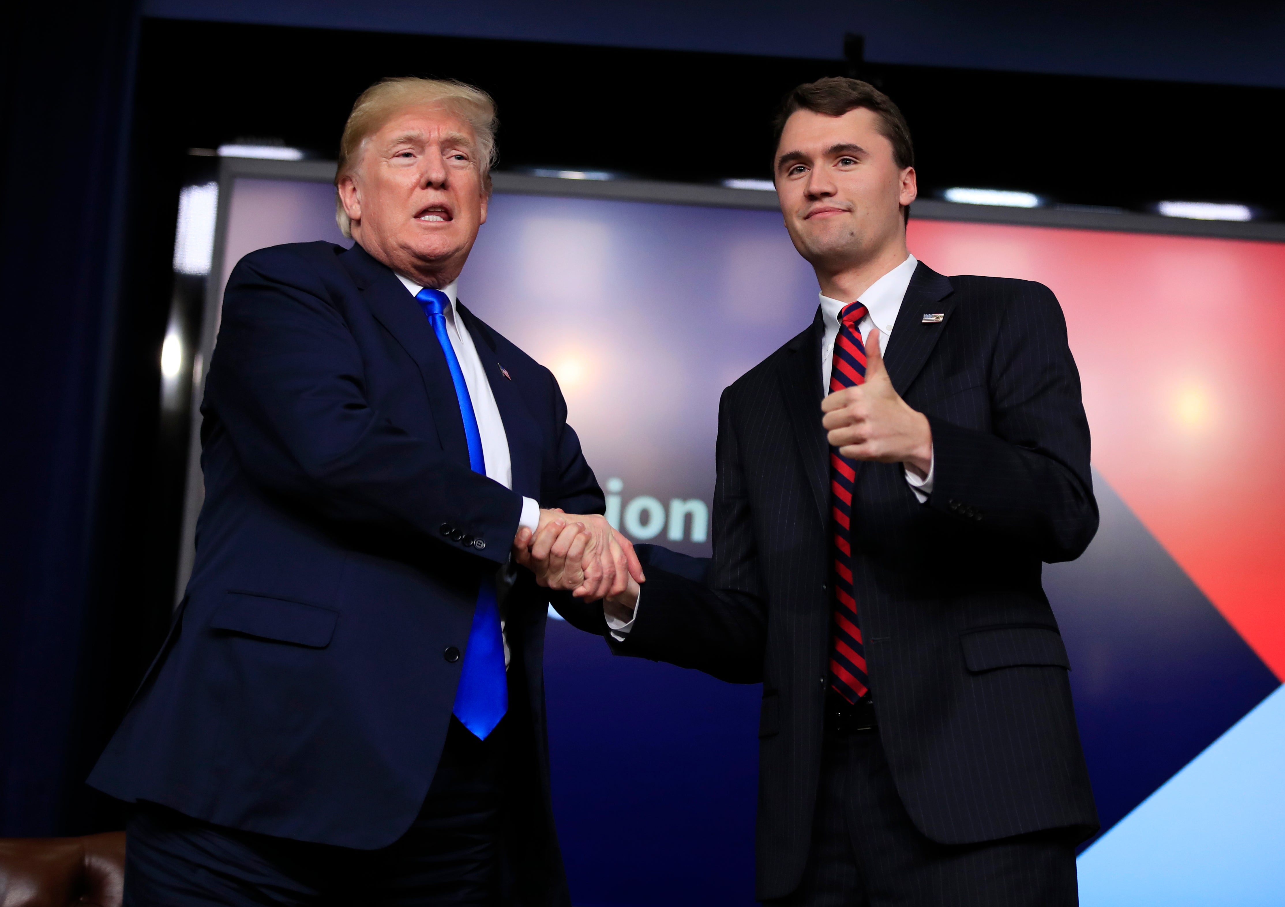Charlie Kirk (right) was a key ally of President Donald Trump