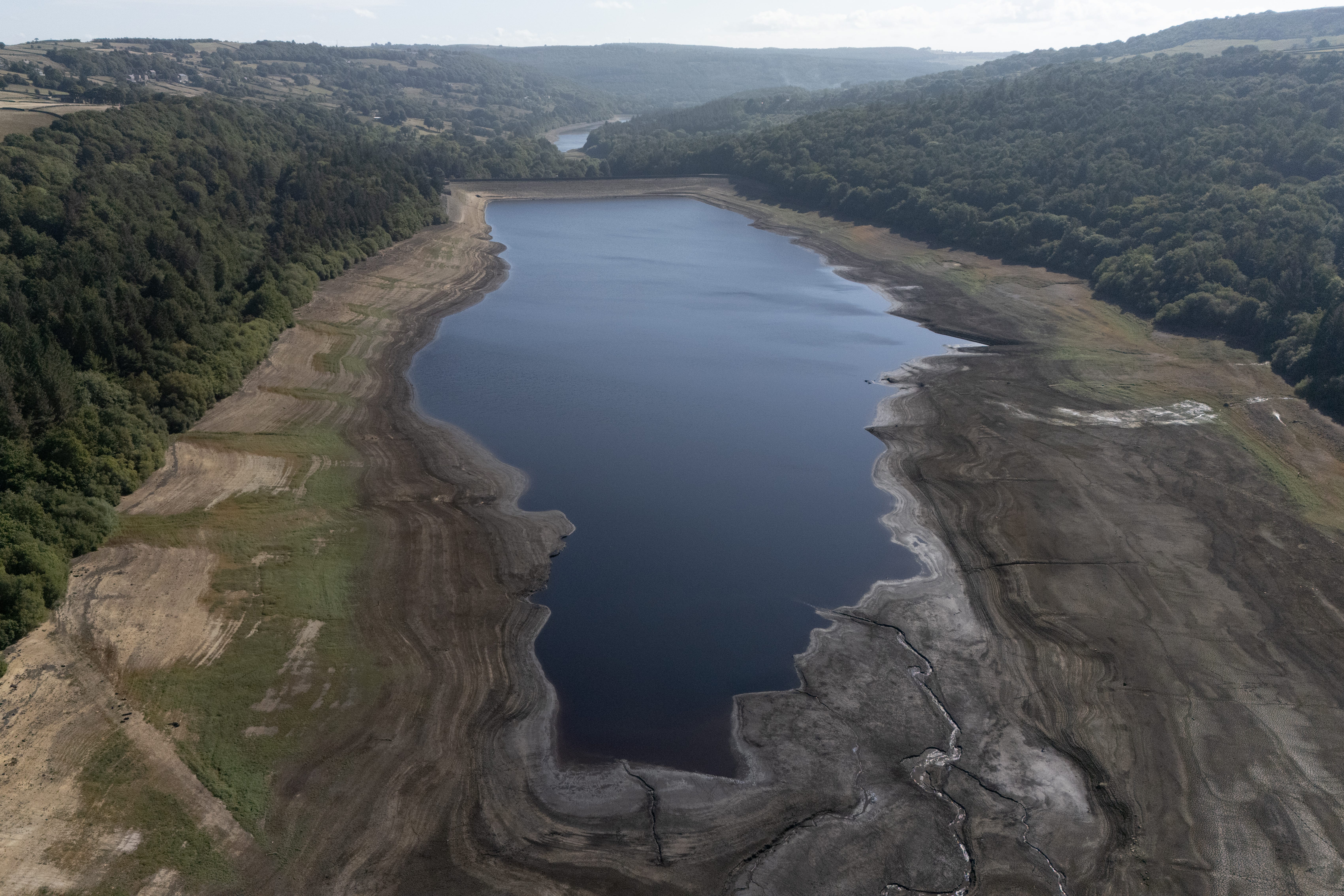 Water levels have dropped at many reservoirs across England following the warmest spring and summer on record, including at Broomhead Reservoir in South Yorkshire (Richard McCarthy/PA)