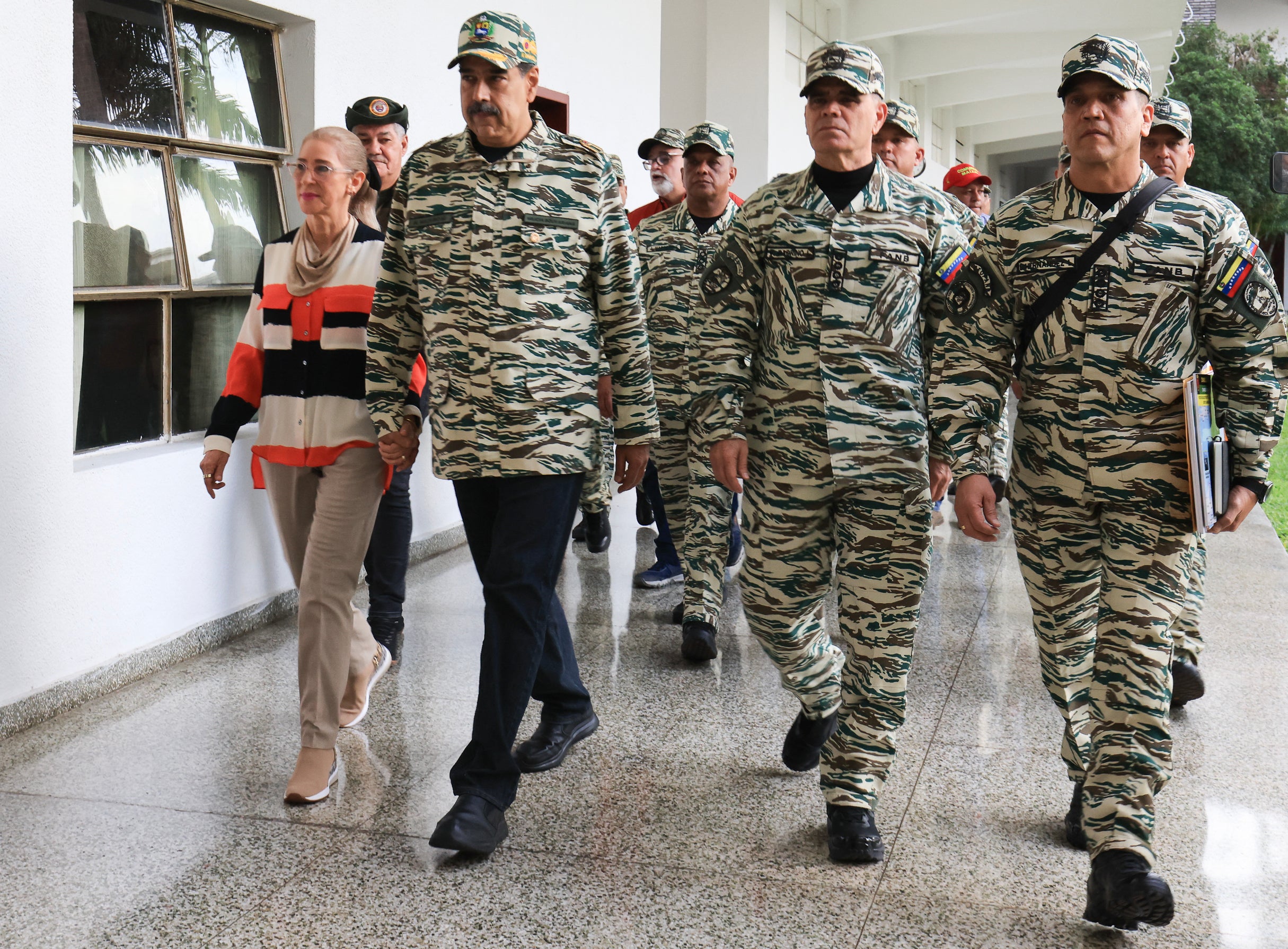 Venezuela's President Nicolas Maduro (2nd-L) has been in a war of words with Trump