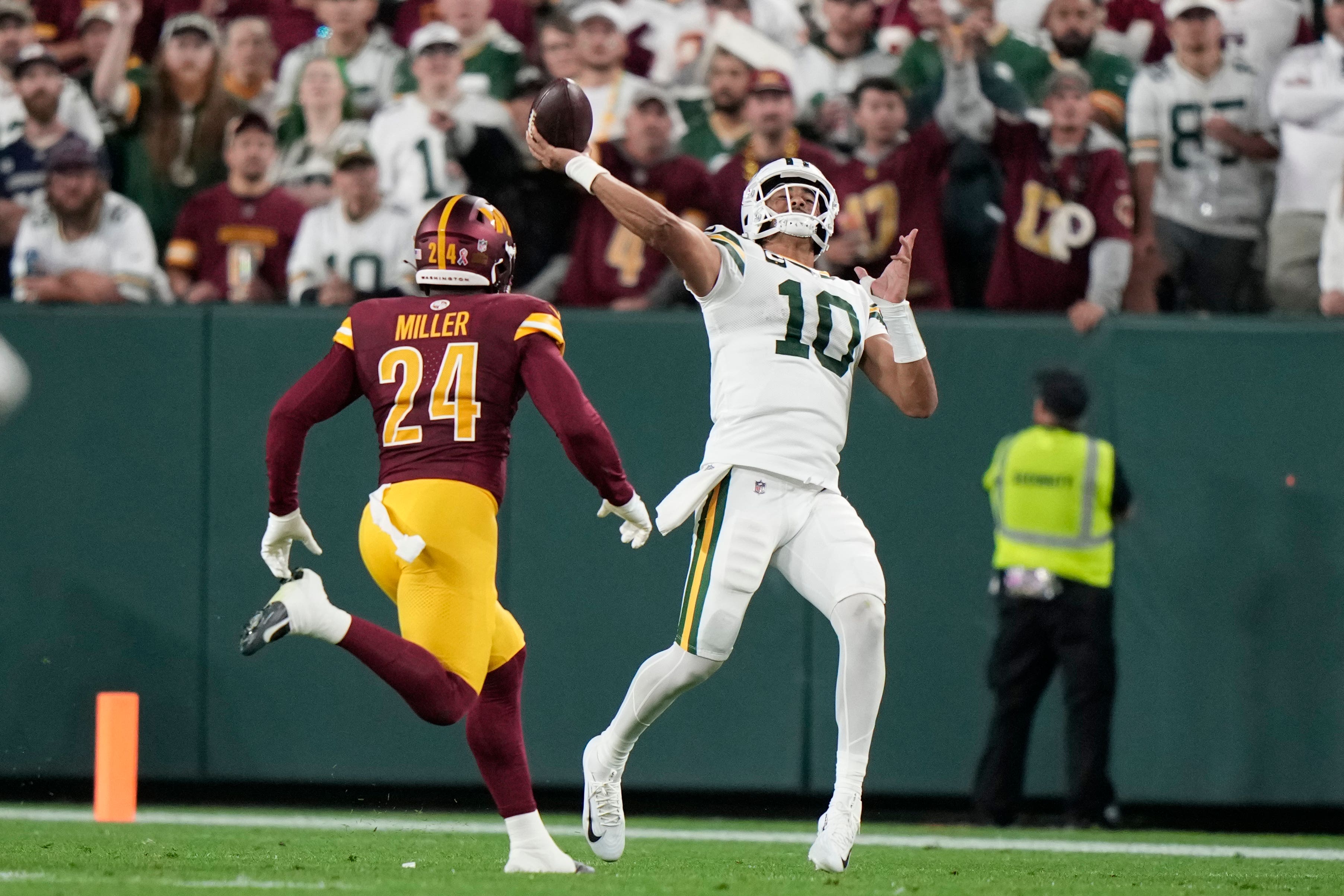 Green Bay Packers quarterback Jordan Love (10) throws under pressure from Washington Commanders outside linebacker Von Miller (24) (Morry Gash/AP)