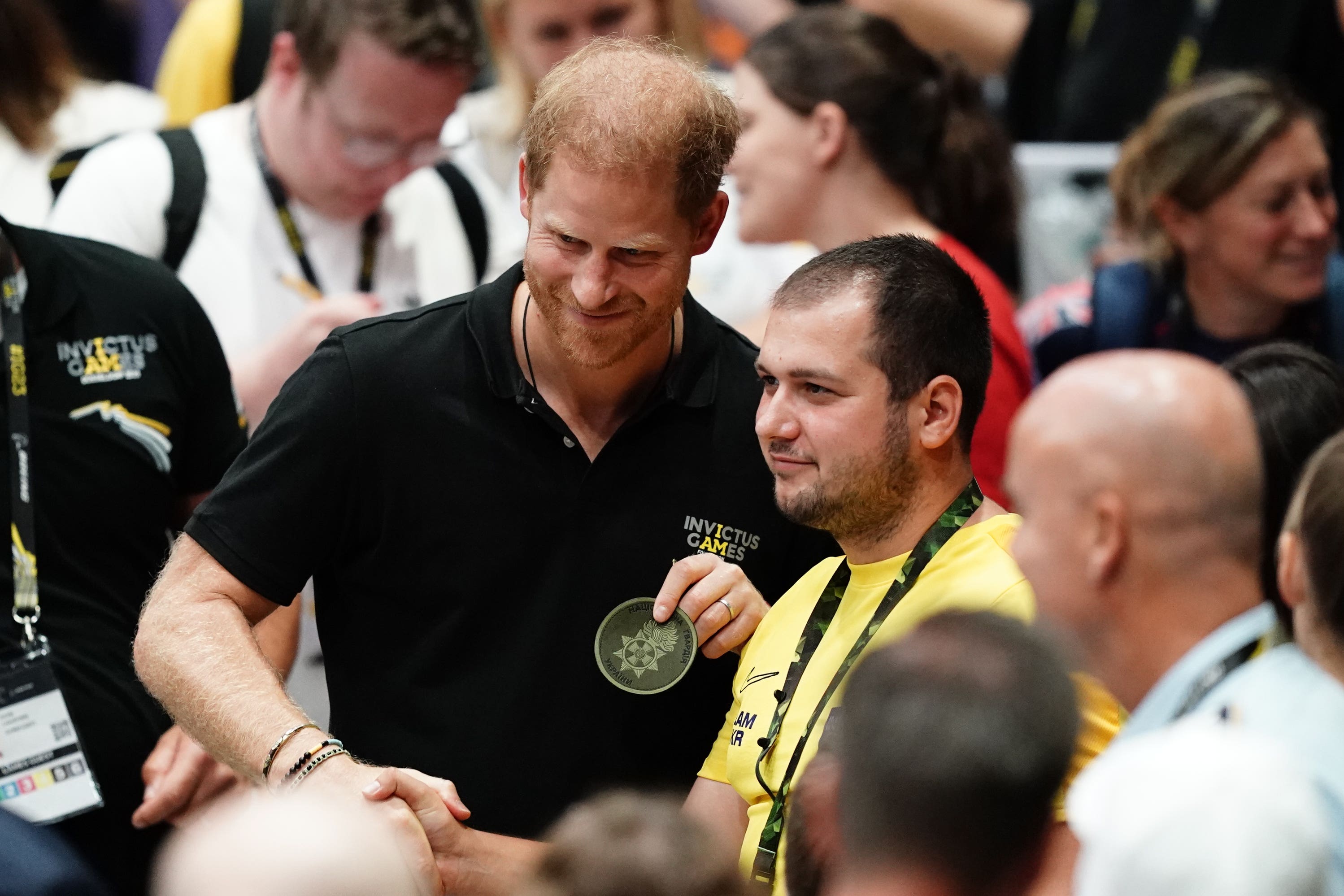 The Duke of Sussex (centre) poses with Team Ukraine athletes at the wheelchair basketball competition during the 2023 Invictus Games