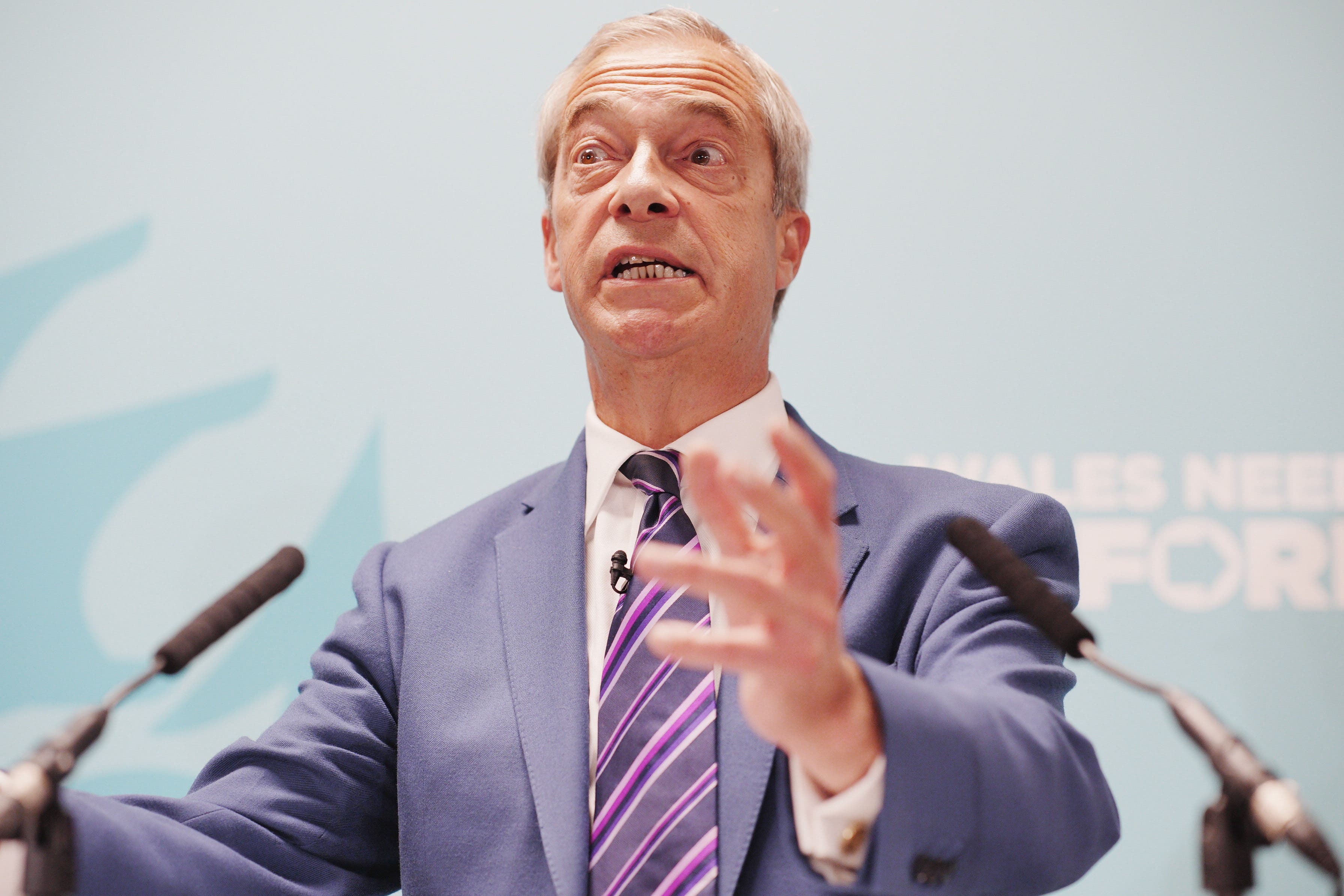 Nigel Farage insisted he and his partner Laure Ferrari had ‘done everything right’ over her purchase of a home in his Clacton constituency (Ben Birchall/PA)