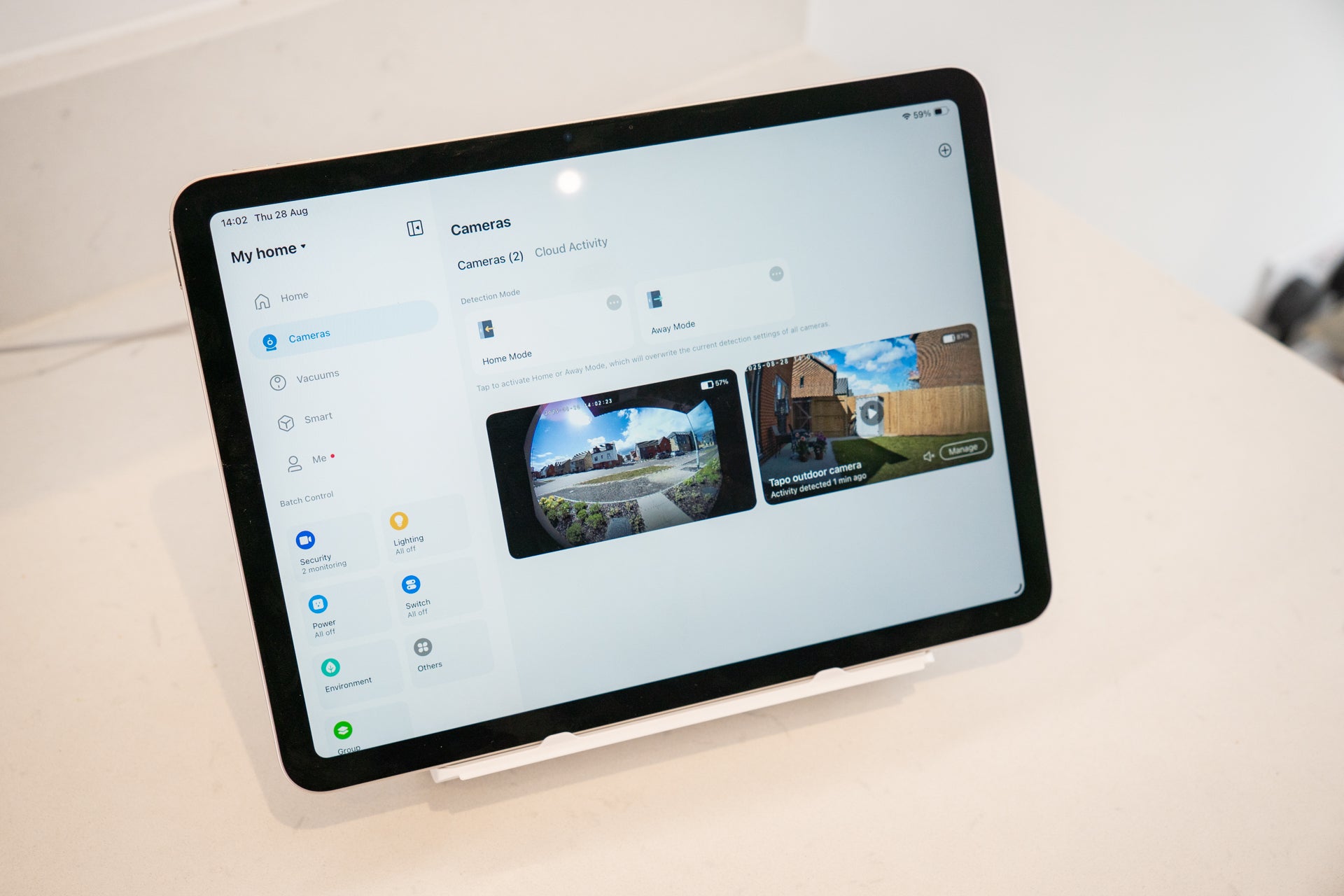 The Tapo app for iPad shows smart home controls and security camera video feeds
