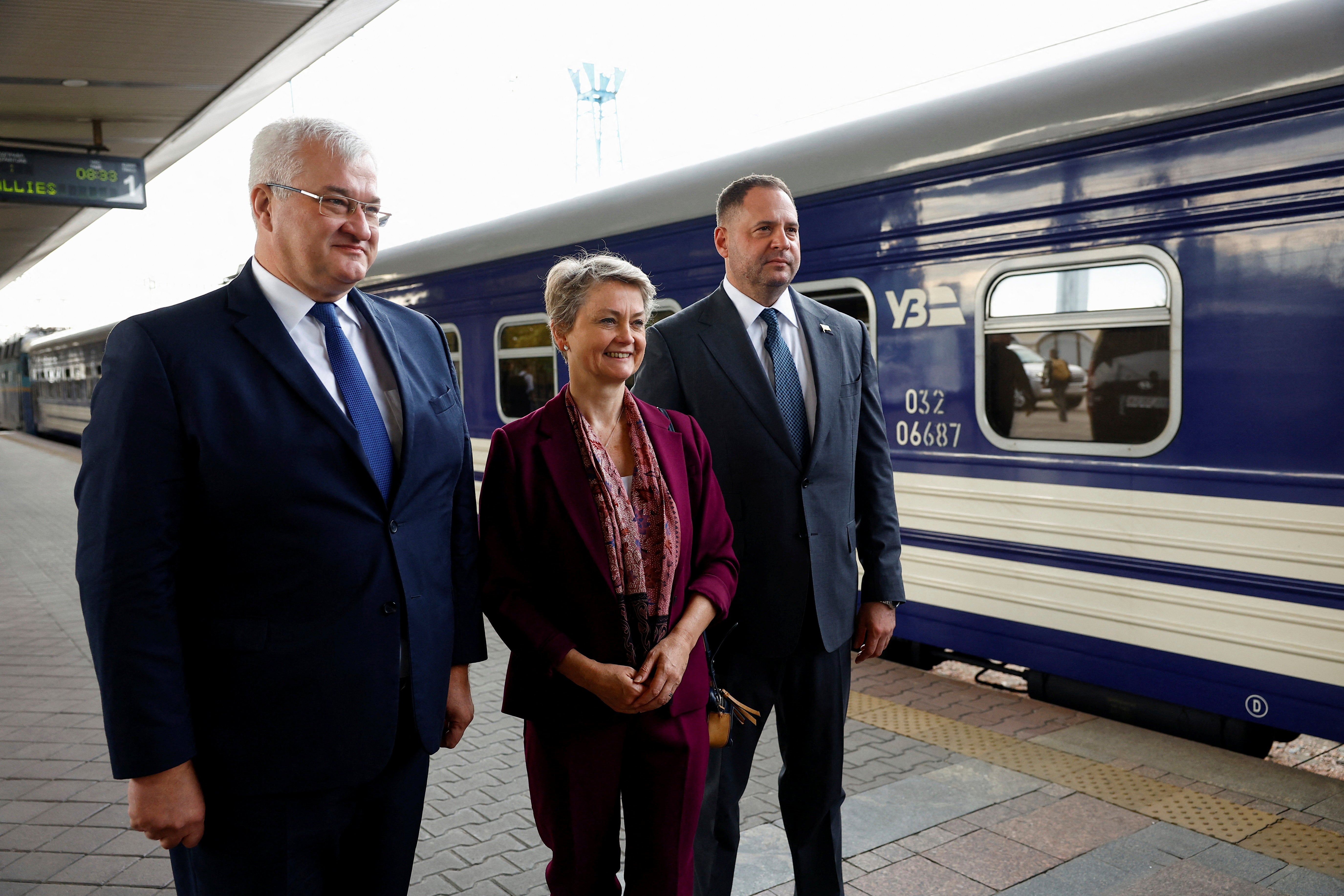 Ukrainian Foreign Minister Andrii Sybiha, left, and Head of the Office of the President of Ukraine Andriy Yermak, right, welcome British Foreign Secretary Yvette Cooper upon her arrival at a railway station, amid Russia's attack on Ukraine, in Kyiv, Ukraine, Friday Sept. 12, 2025. (Valentyn Ogirenko/Pool Photo via AP)