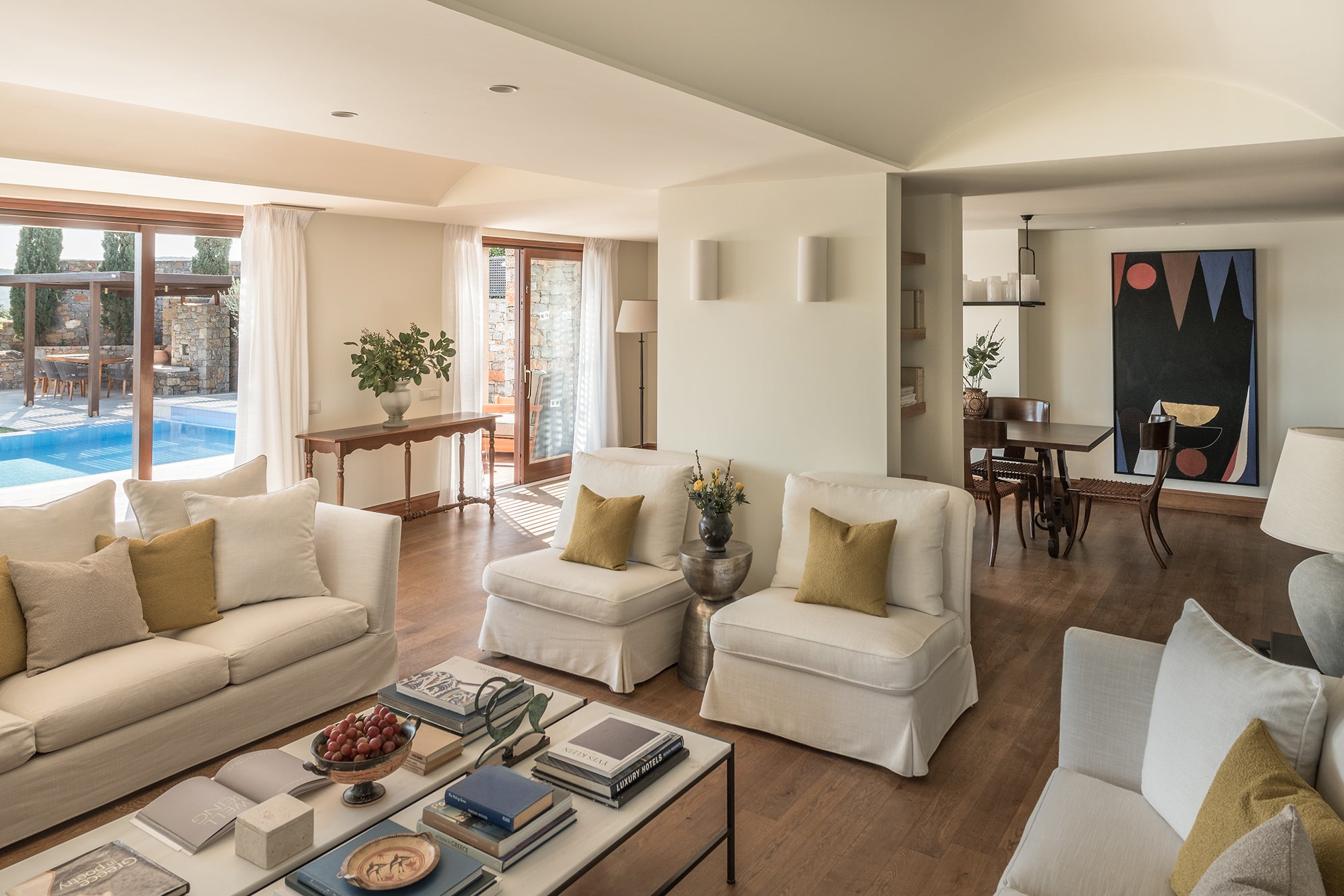 A villa at Phaea Blue, complete with a lounge and dining area