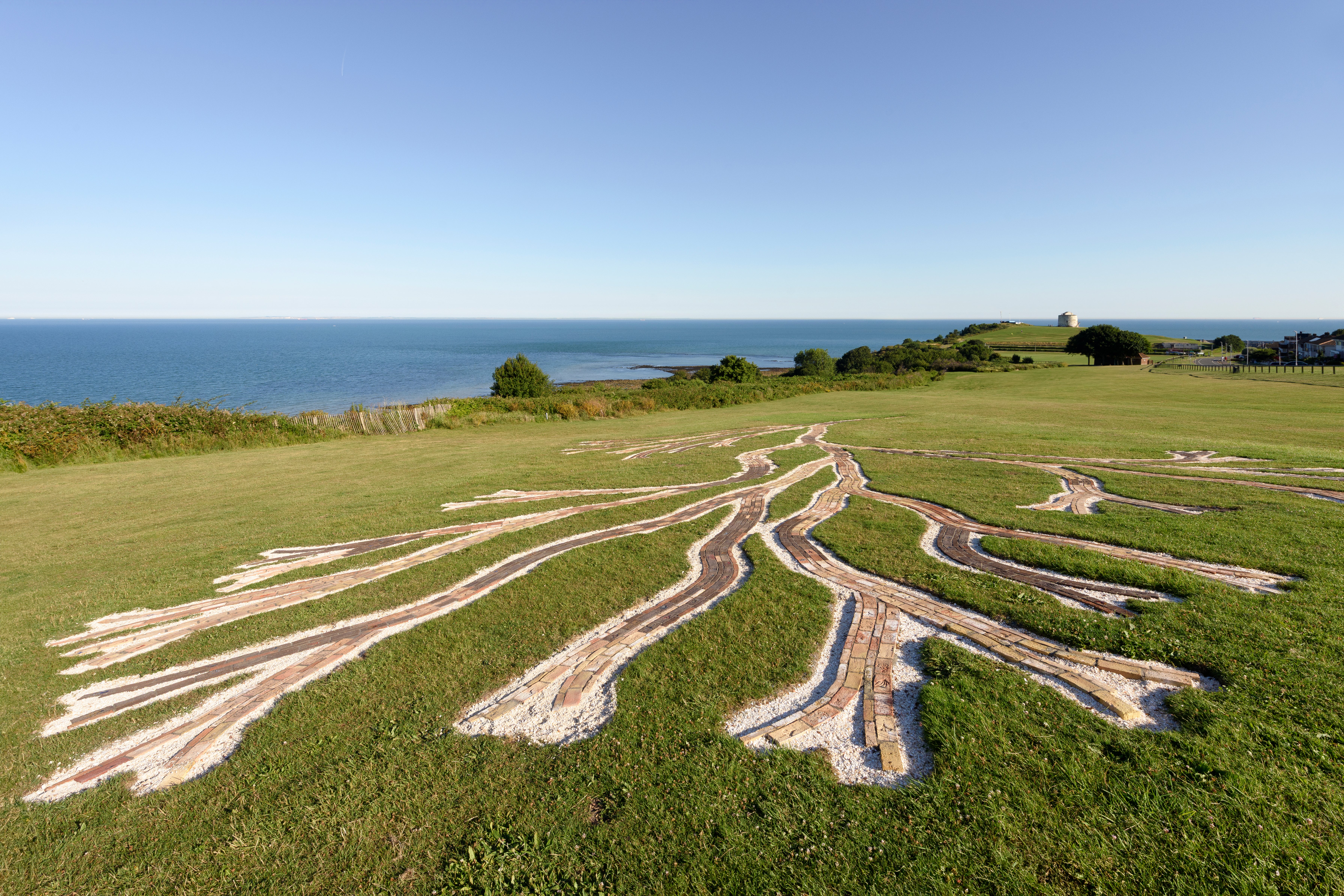 On the grassy cliffs of Folkestone lies Jennifer Tee’s Oceans Tree of Life, one of the many contemporary artworks found in the seaside town for the Triennial art show