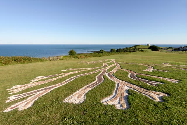<p>On the grassy cliffs of Folkestone lies Jennifer Tee’s Oceans Tree of Life, one of the many contemporary artworks found in the seaside town for the Triennial art show </p>