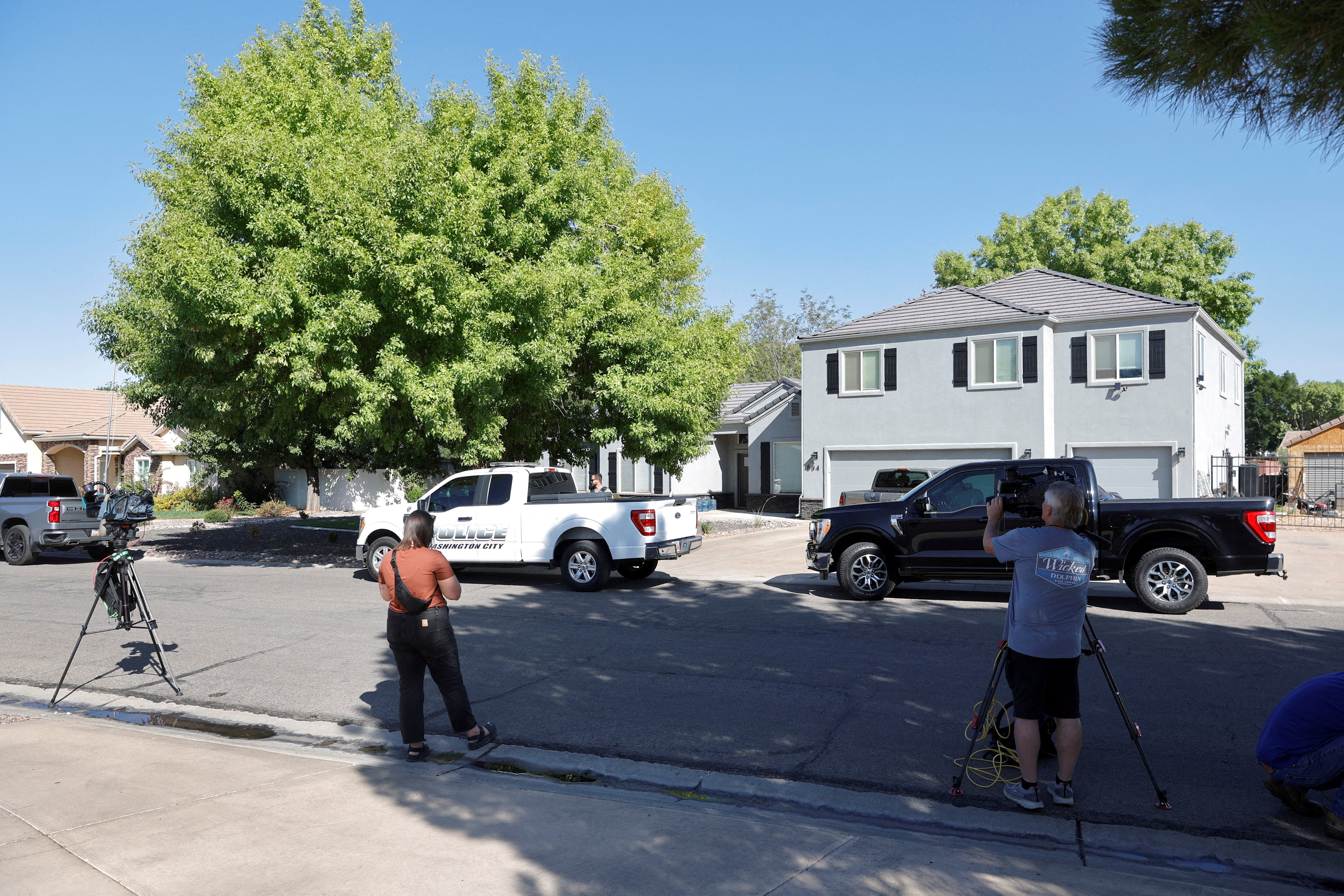 Law enforcement officials at Robinson’s home in Washington County, Utah
