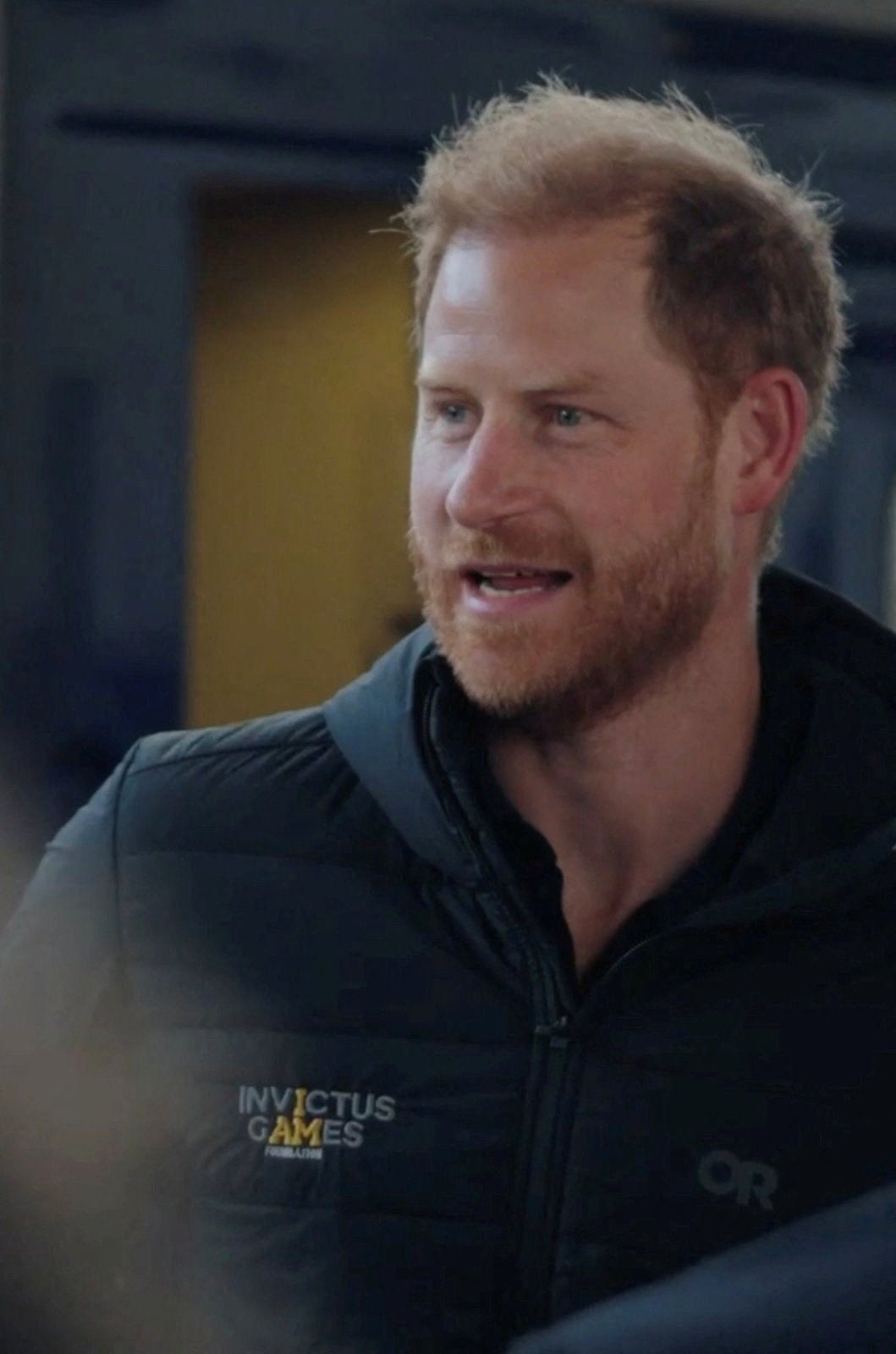 Harry speaks with people upon his arrival by train in Kyiv on Friday