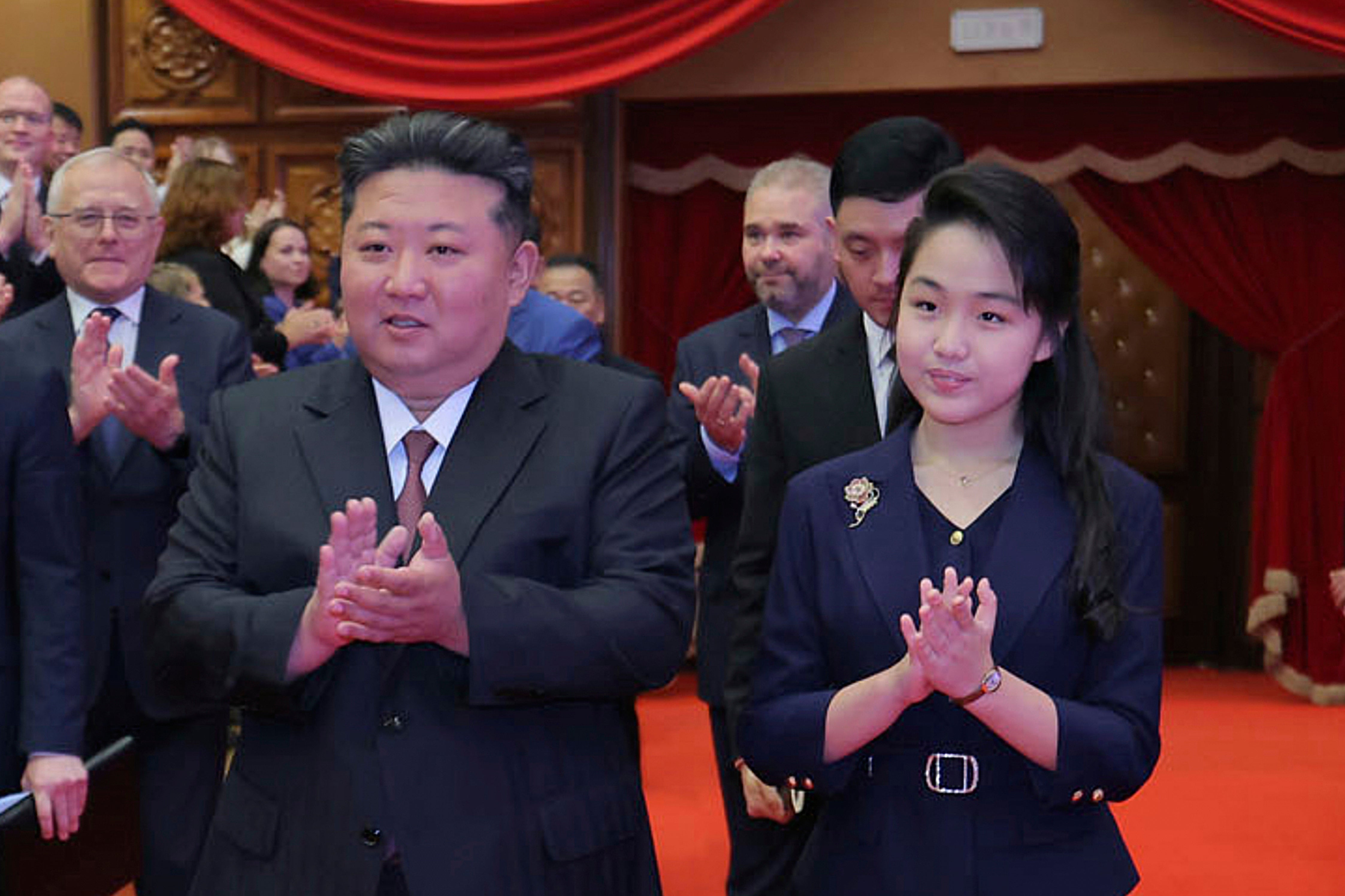 North Korean leader Kim Jong Un and his daughter arrive at the East Pyongyang Grand Theatre