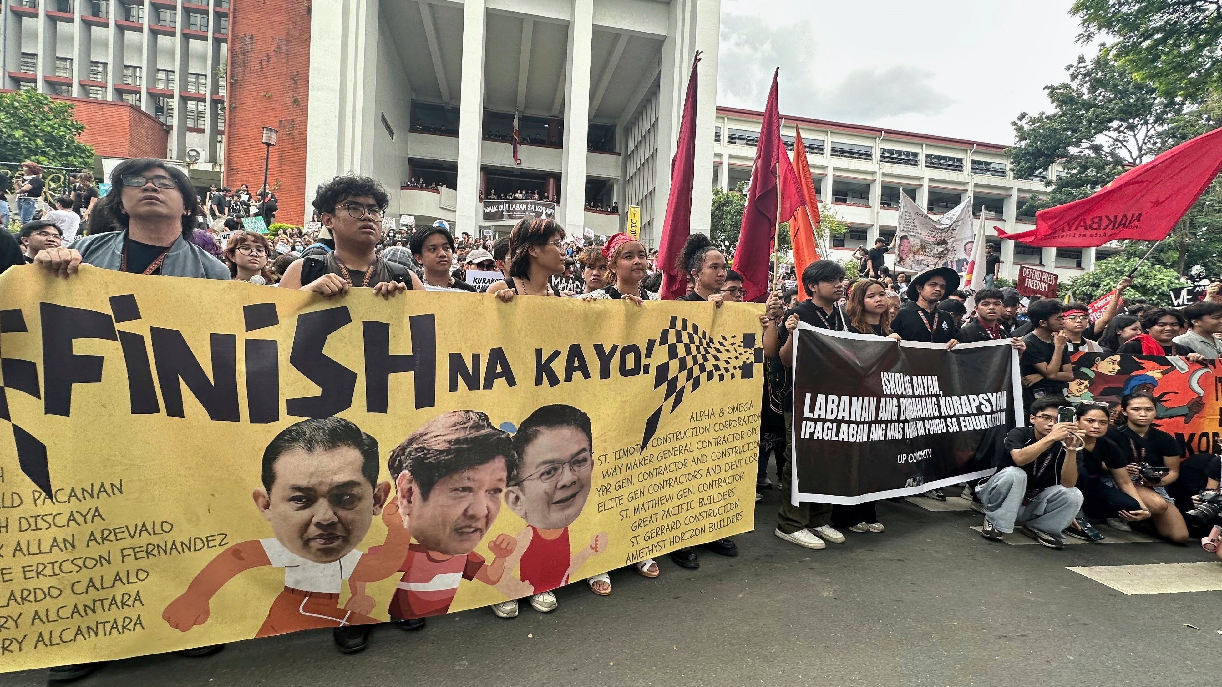 Hundreds of students at the University of the Philippines walk out of their classes and protest against corruption in government projects in Manila