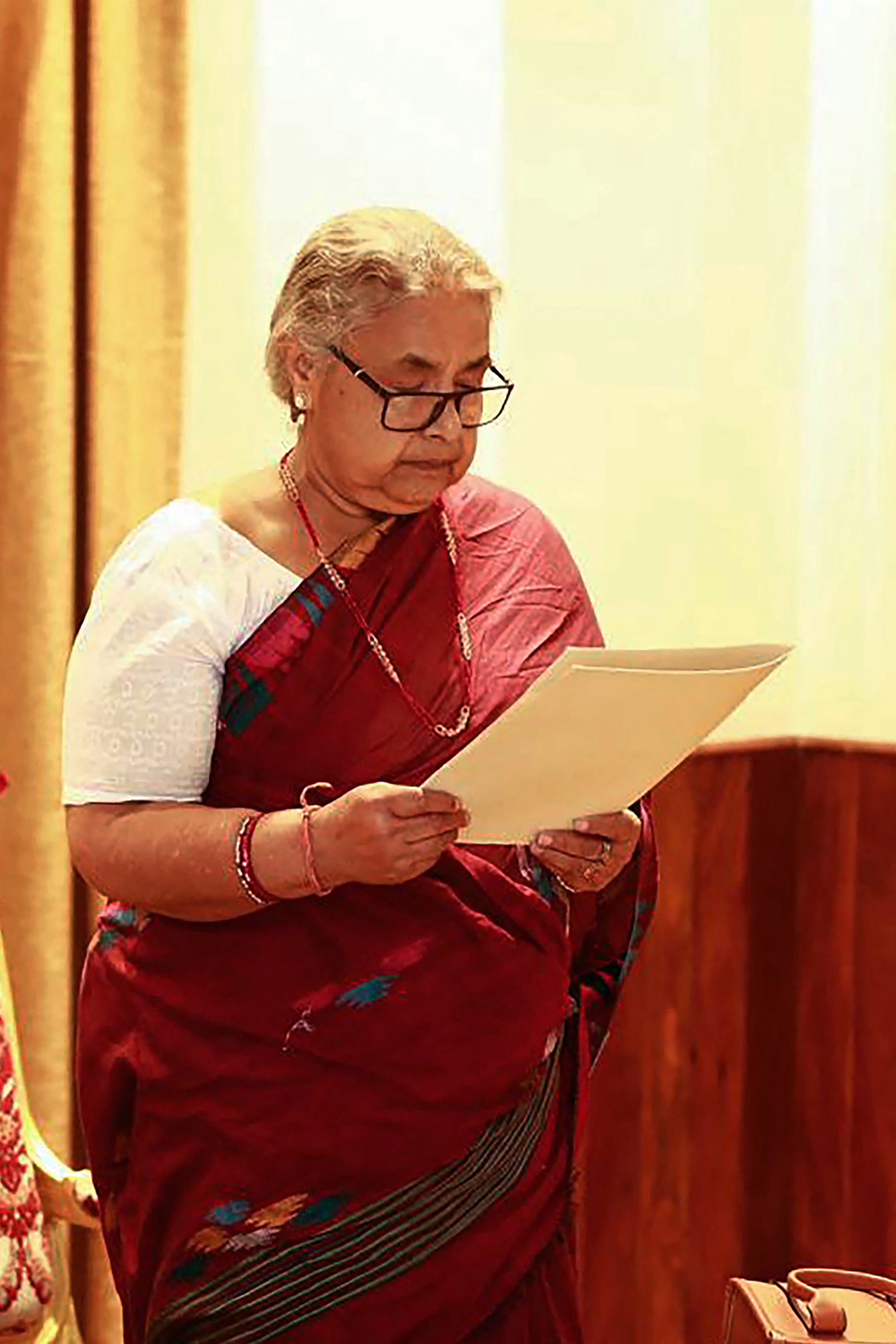 Nepal's newly appointed Prime Minister Sushila Karki attends her swearing-in-ceremony at the President House in Kathmandu on September 12, 2025