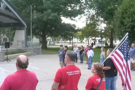 Despite Office Depot incident, local organizers later printed Kirk poster elsewhere and held vigil in Kalamazoo park