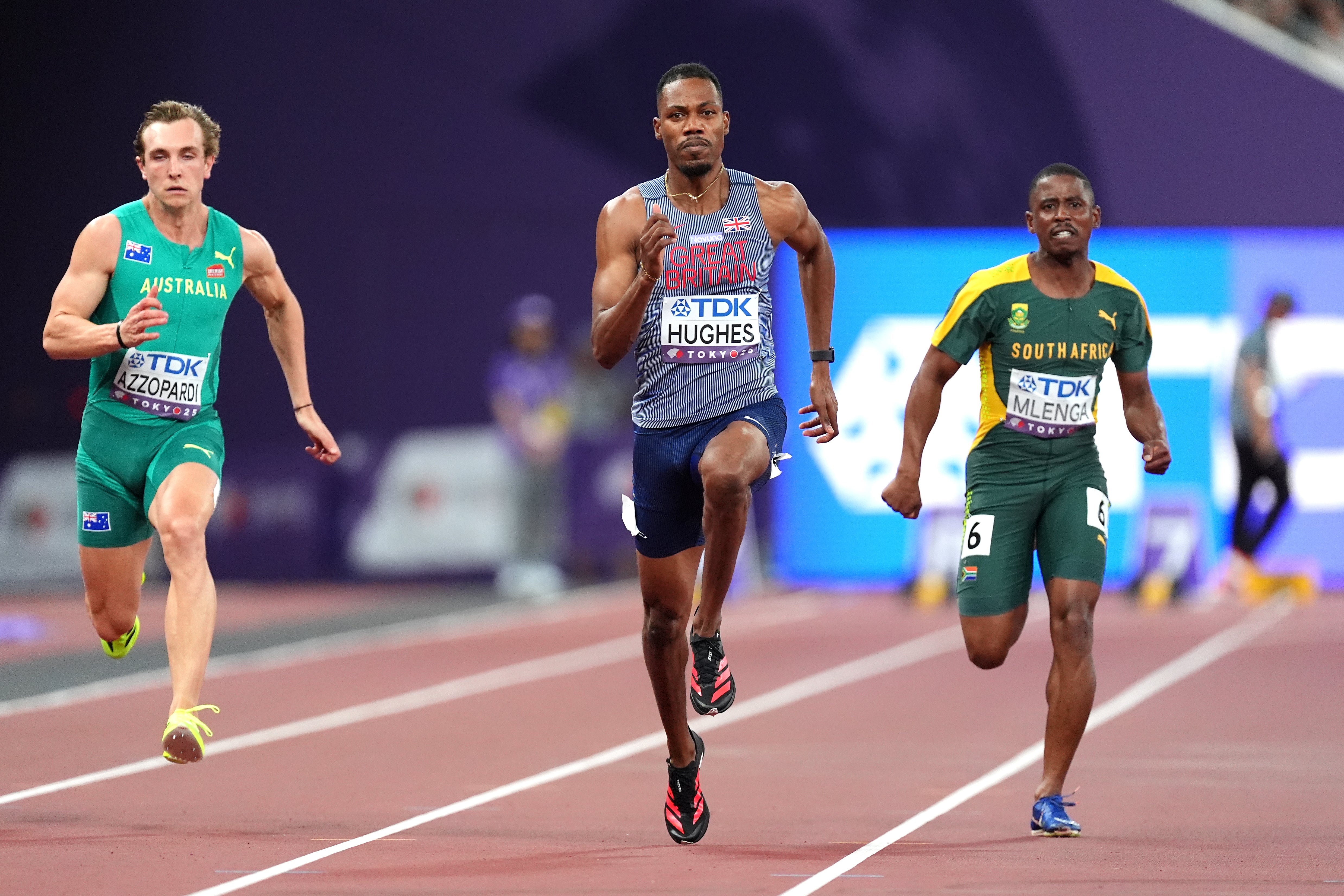 Great Britain’s Zharnel Hughes, centre, in the 100m heats at the World Championships