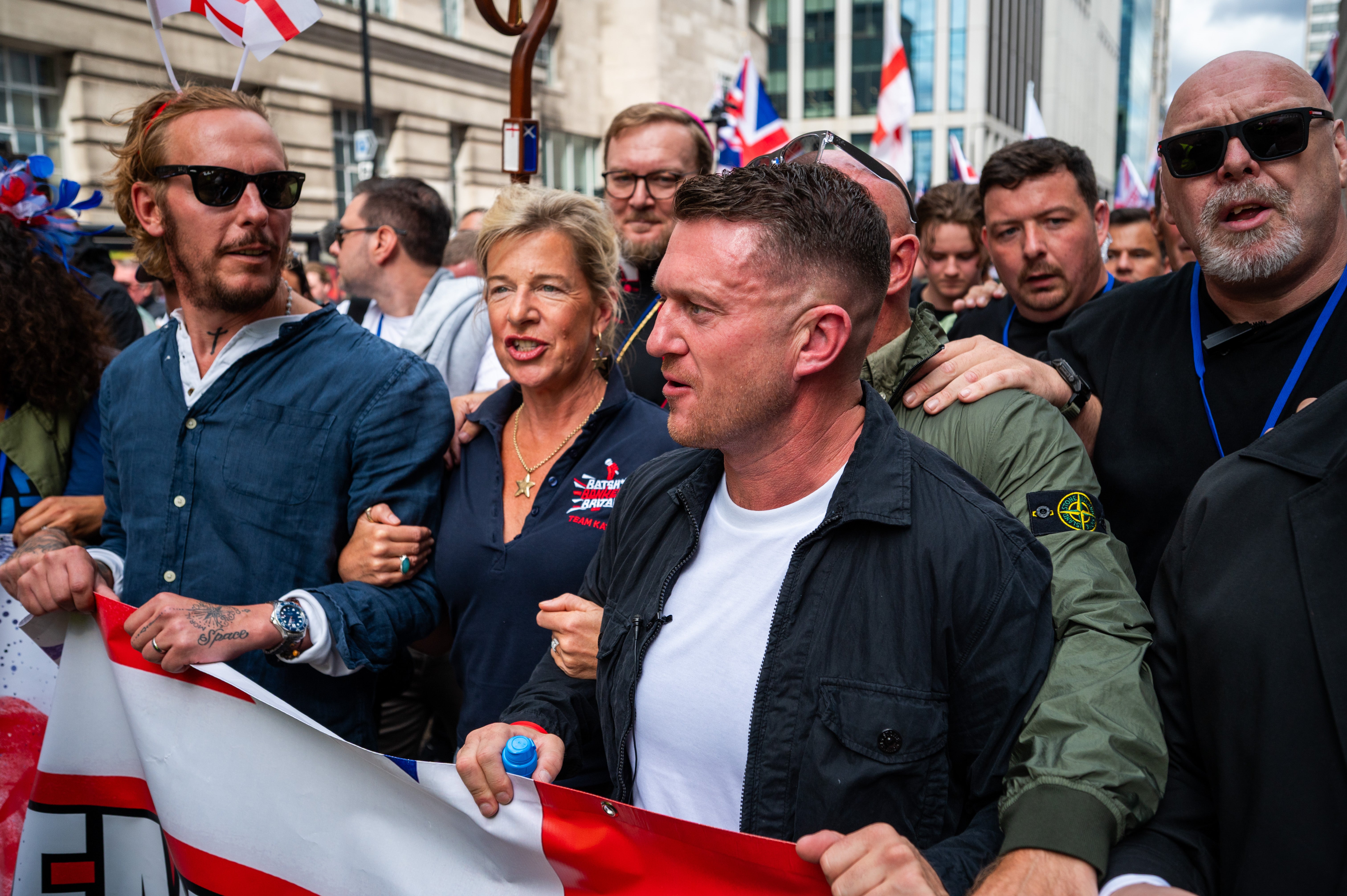 Tommy Robinson (right) attends the ‘Unite The Kingdom’ rally on Saturday alongside Laurence Fox (left) and Katie Hopkins (centre)