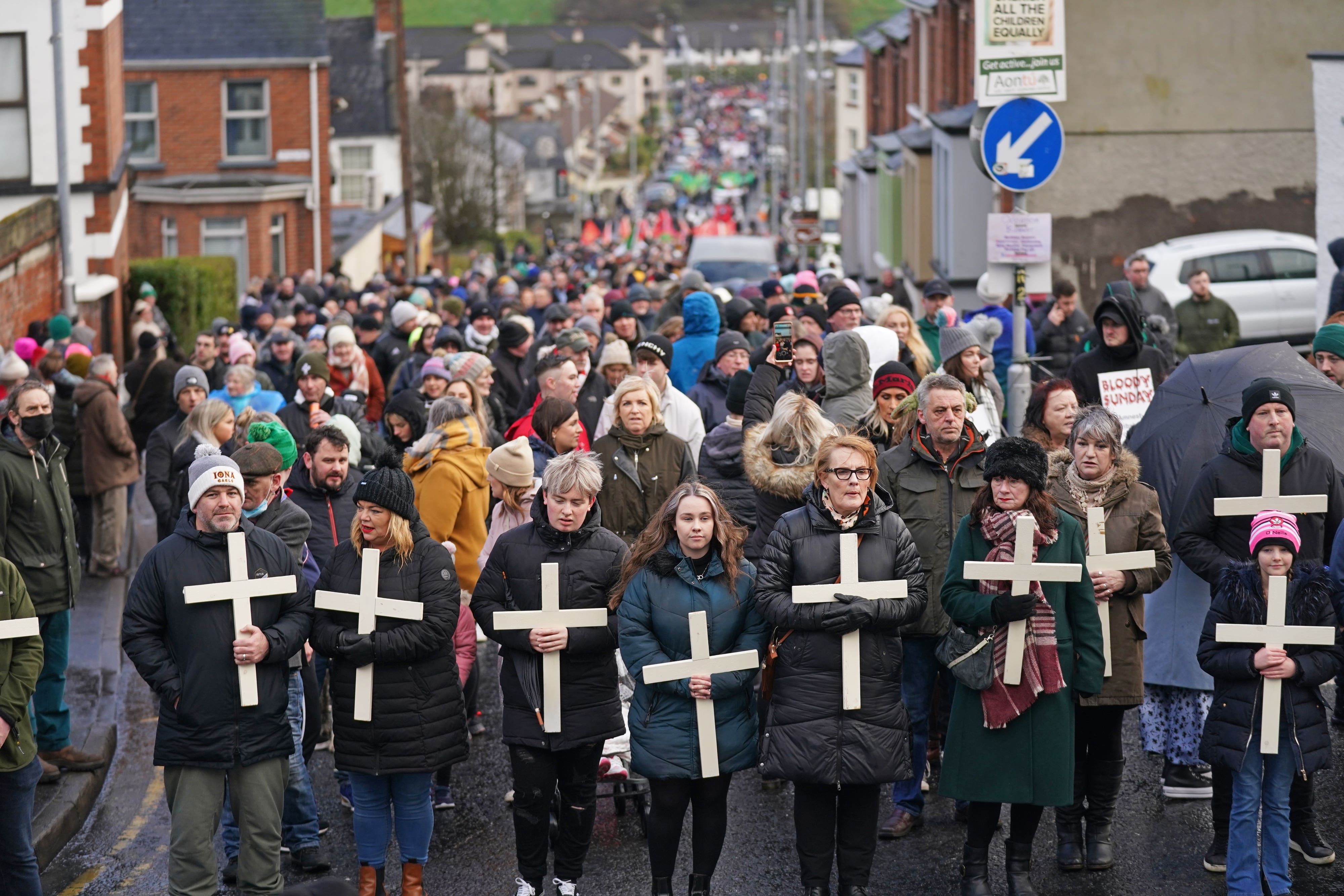 People take part in a march to mark the 50th anniversary of Bloody Sunday in Derry. Picture date: Sunday January 30, 2022.