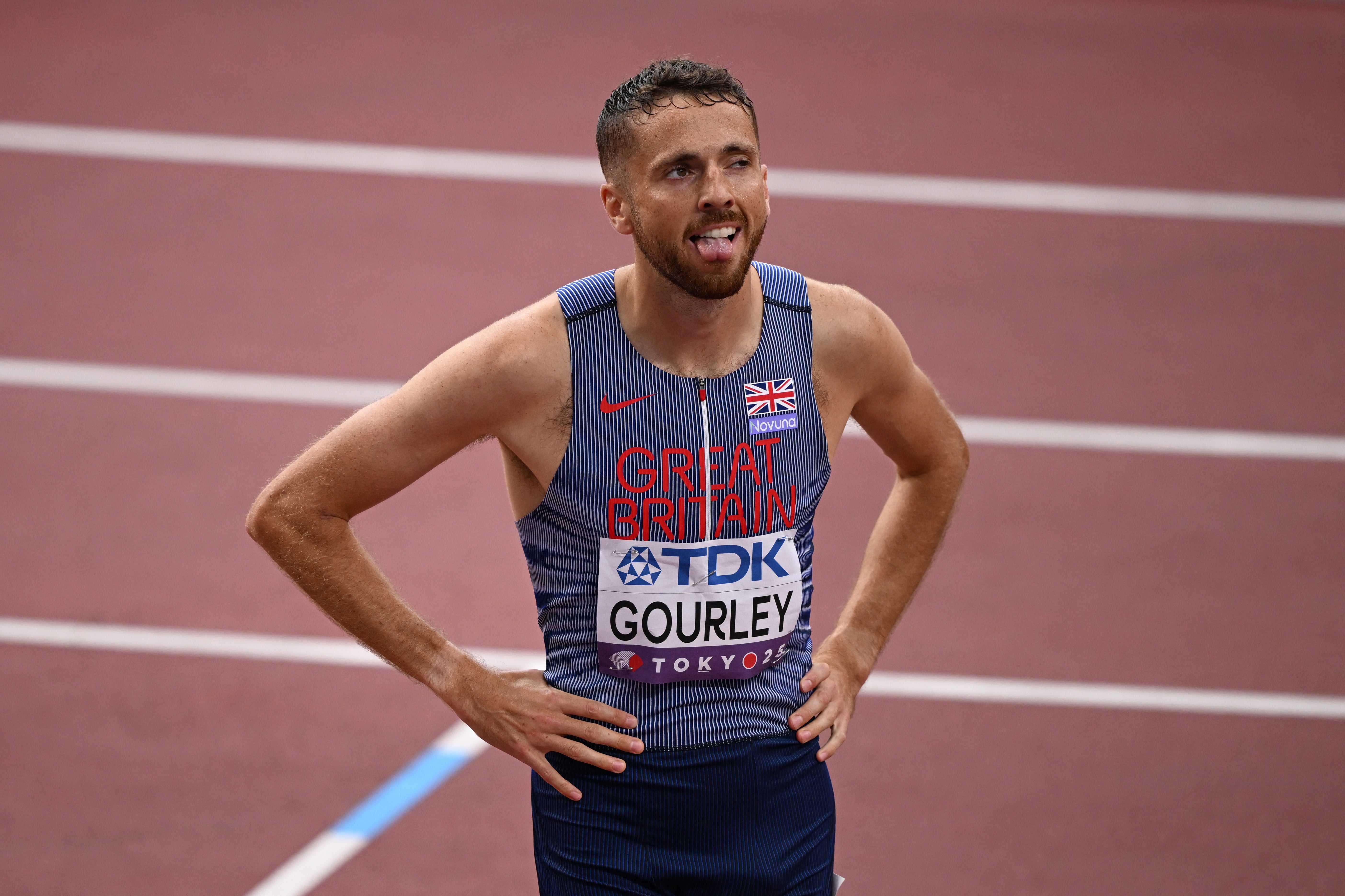 Britain's Neil Gourley reacts after qualifying from his heat