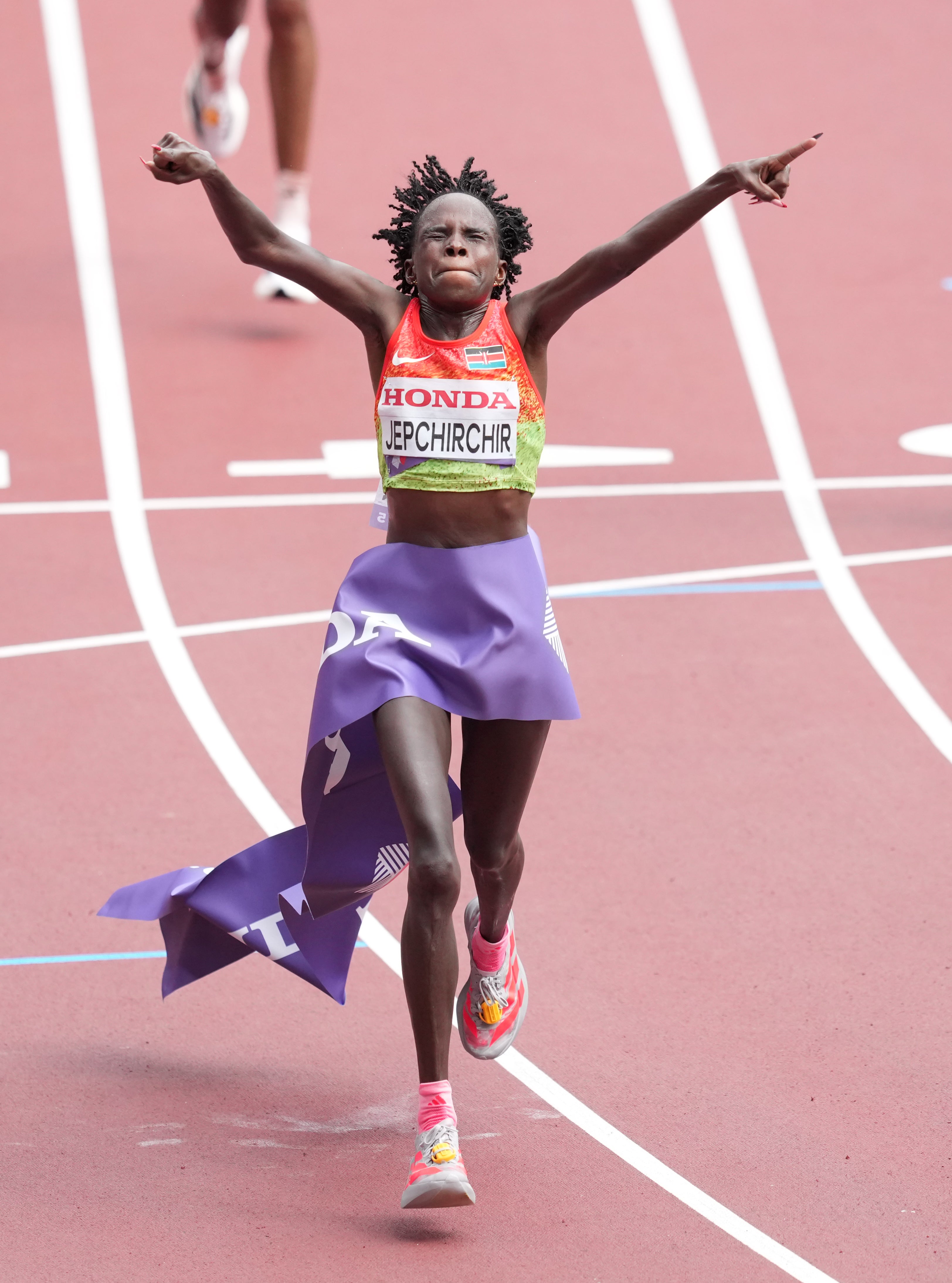 Kenya's Peres Jepchirchir celebrates winning the Women's Marathon