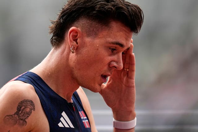 <p>Norway's Jakob Ingebrigtsen reacts after finishing a men's 1,500 meters heat</p>