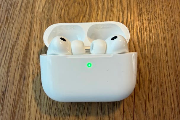 The AirPods Pro 3 in the charging case