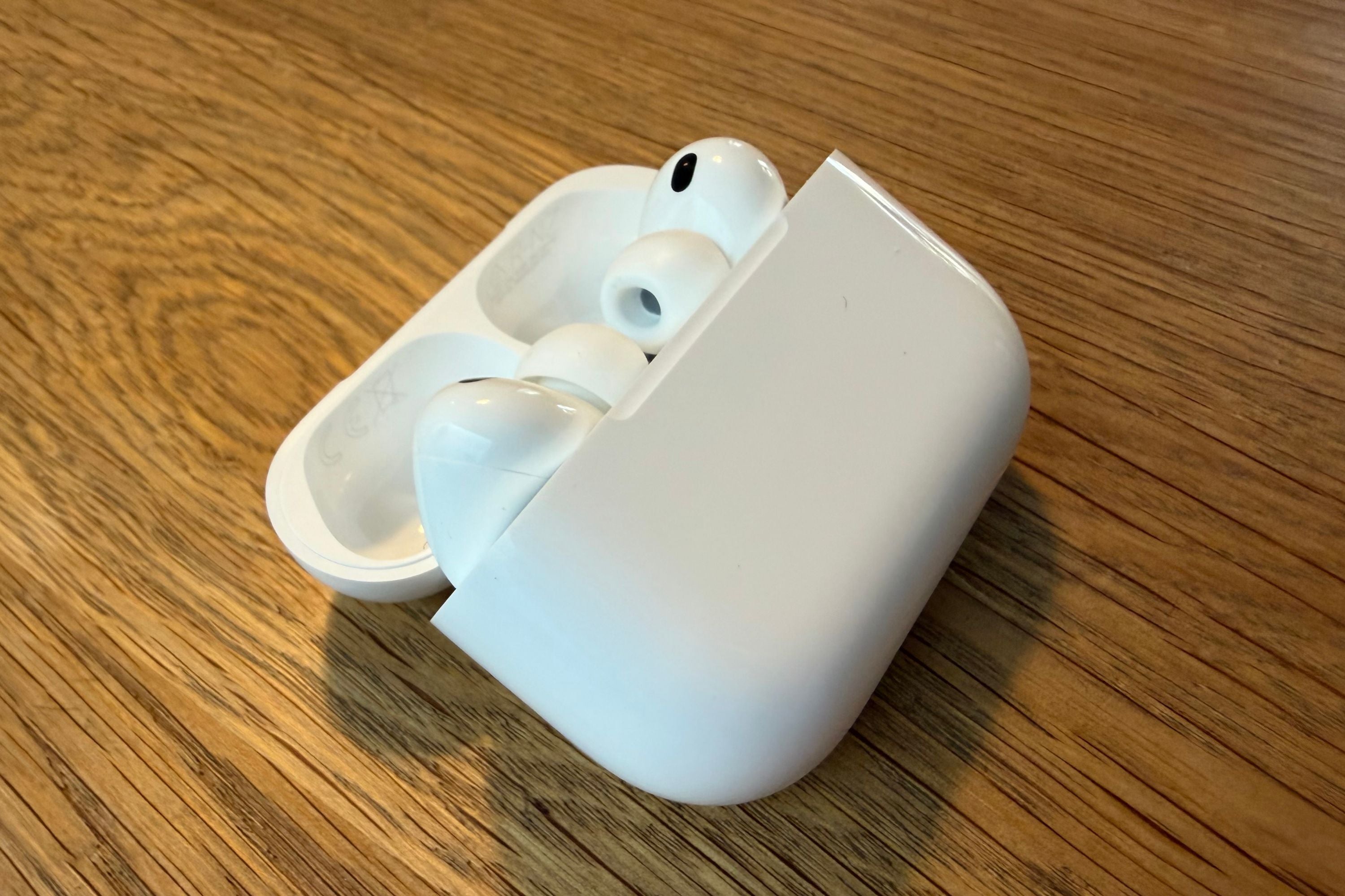Side view of the AirPods Pro 3 in the charging case