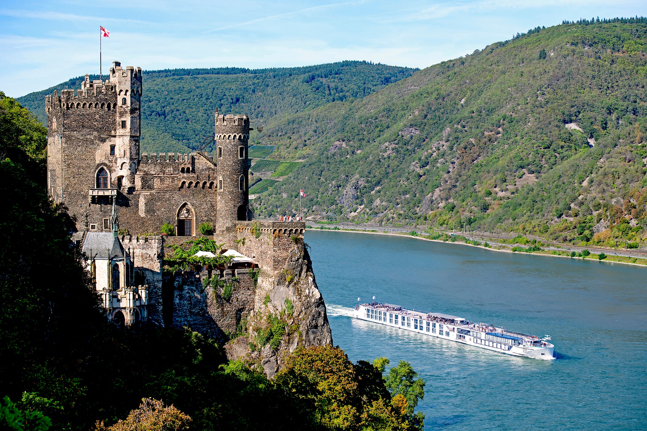 A Riverside luxury cruise sails past Rheinfels Castle in Germany