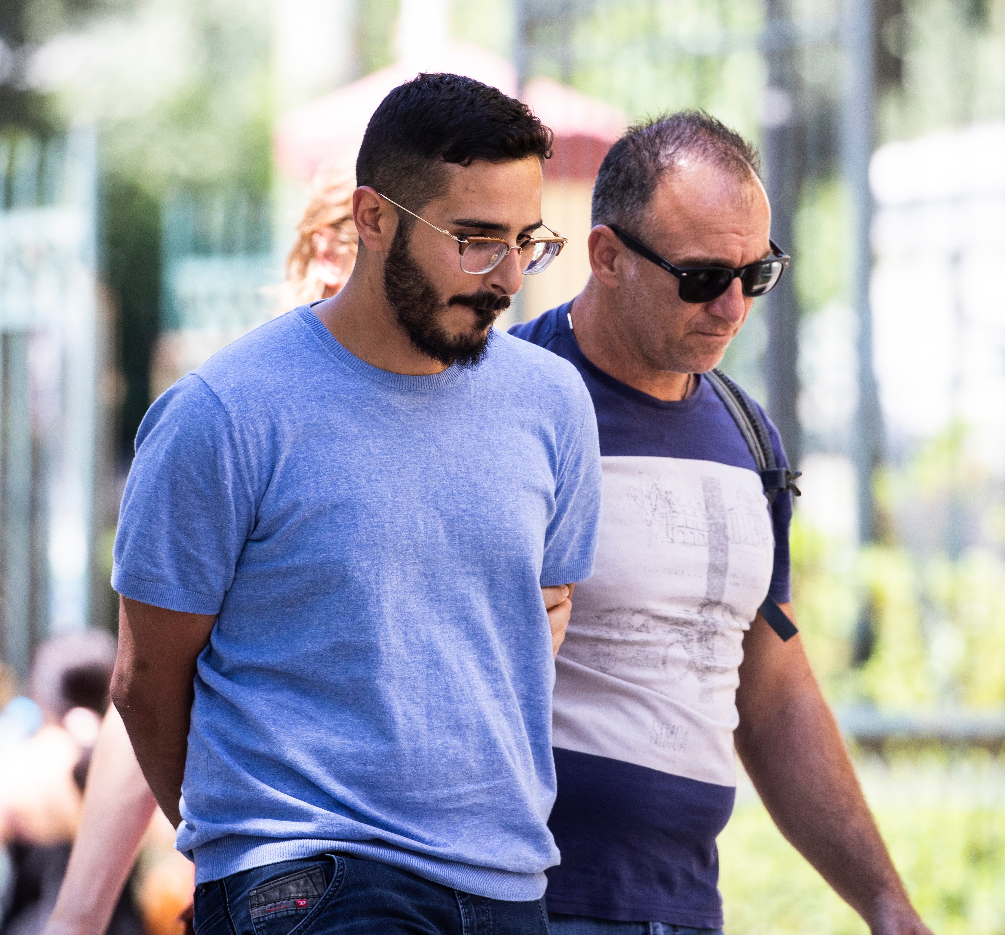 Picture taken on 1 July 2019 shows the ‘Tinder swindler’ as he is expelled from the city of Athens, Greece