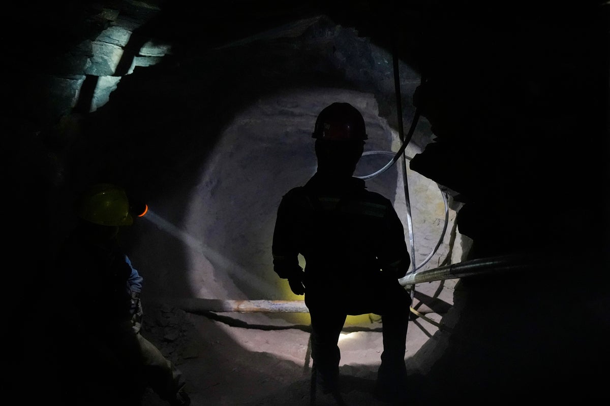 Miner rescued after nearly 14 days trapped in flooded mine collapse