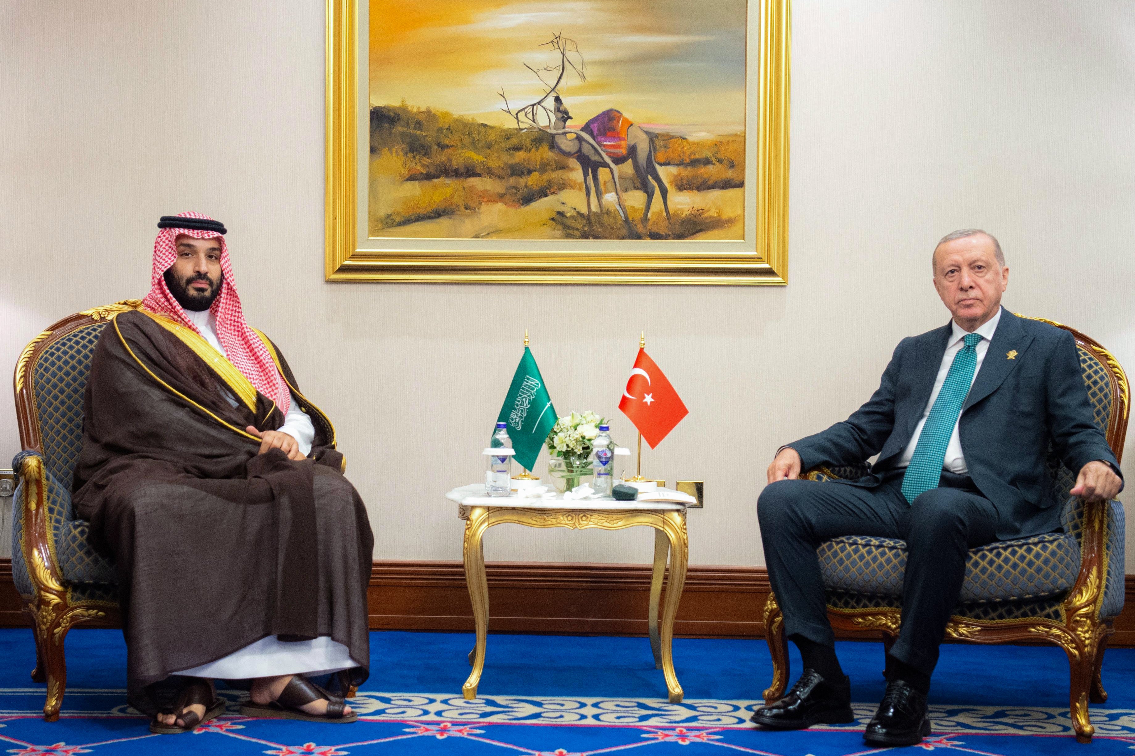 This handout picture released by the official Saudi Press Agency (SPA) shows Saudi Arabia's Crown Prince Mohammed bin Salman (L) meeting with Turkey's President Recep Tayyip Erdogan in Doha on September 15, 2025, on the sidelines of the 2025 Arab-Islamic emergency summit