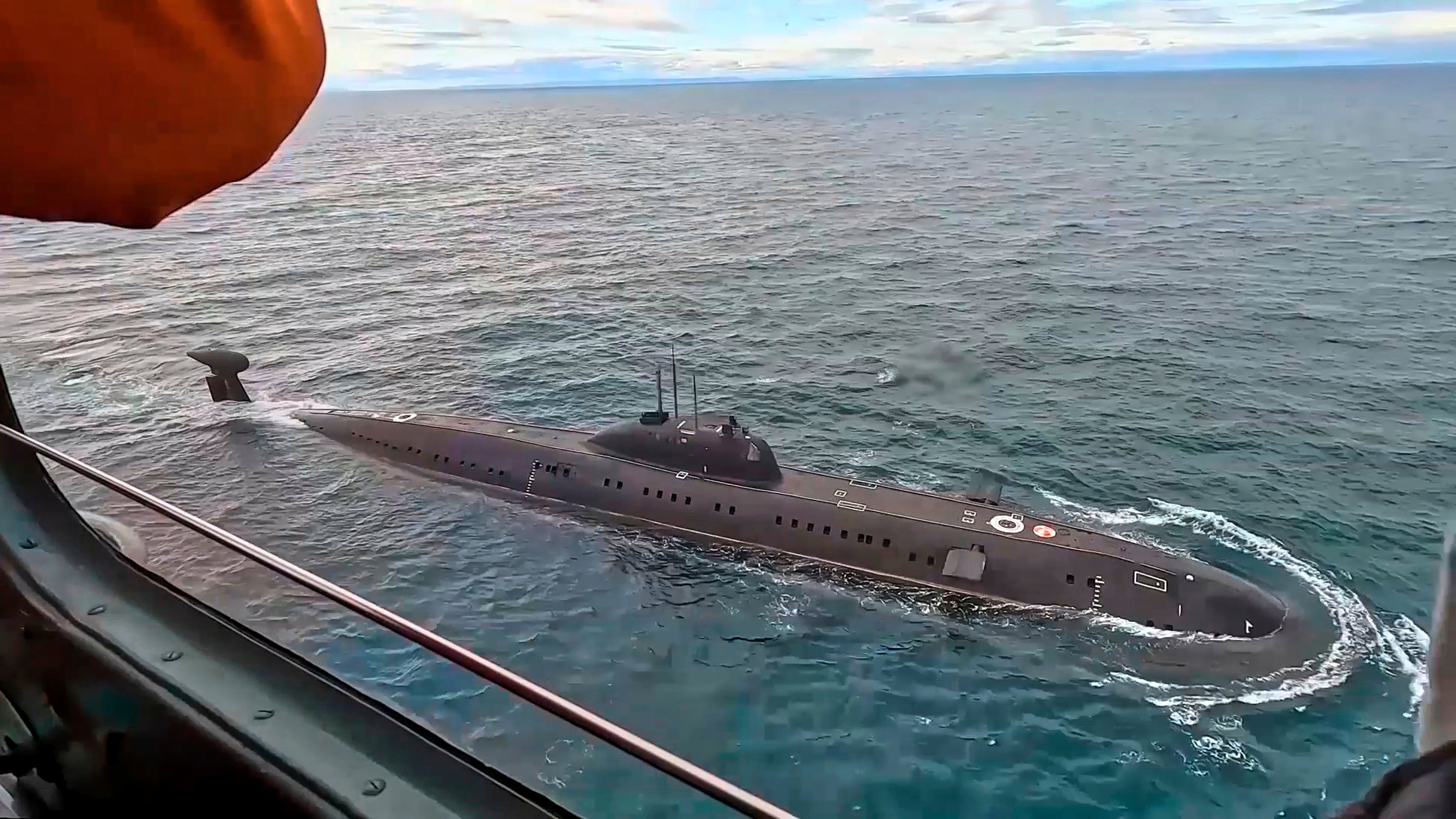 A Russian nuclear submarine is seen during drills in the Barents Sea