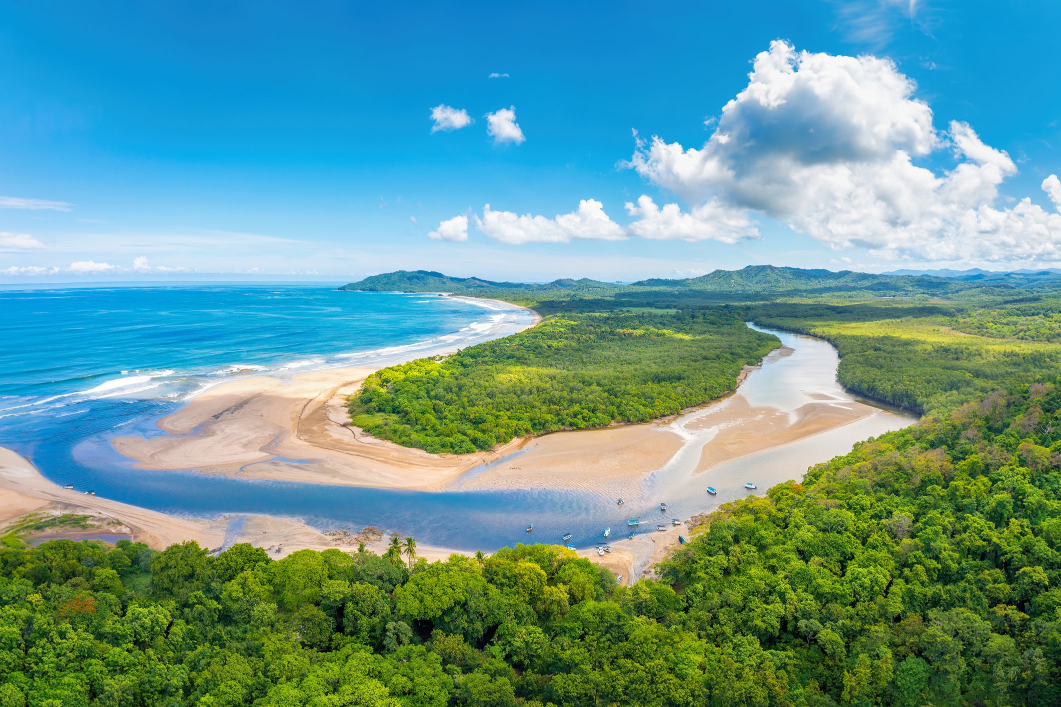 Benefits of Costa Rica's remote working visa include tax exemption and the prospect of permanent residency. Above is Tamarindo Beach and Estuary in the Central American nation.
