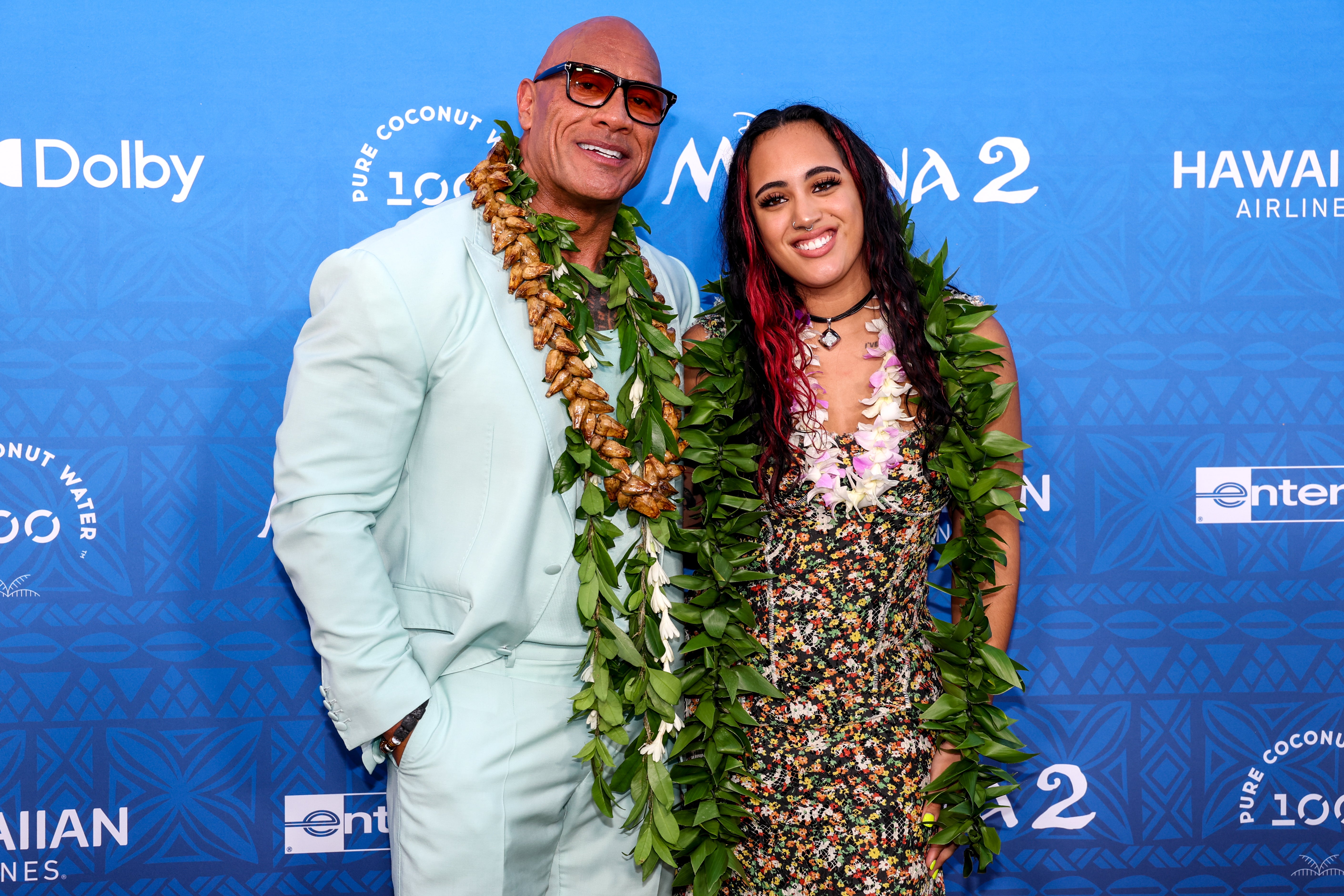 Dwayne Johnson and Simone Garcia Johnson (Ava Raine) attend the world premiere of 'Moana 2' at Lanikuhonua Cultural Institute on November 21