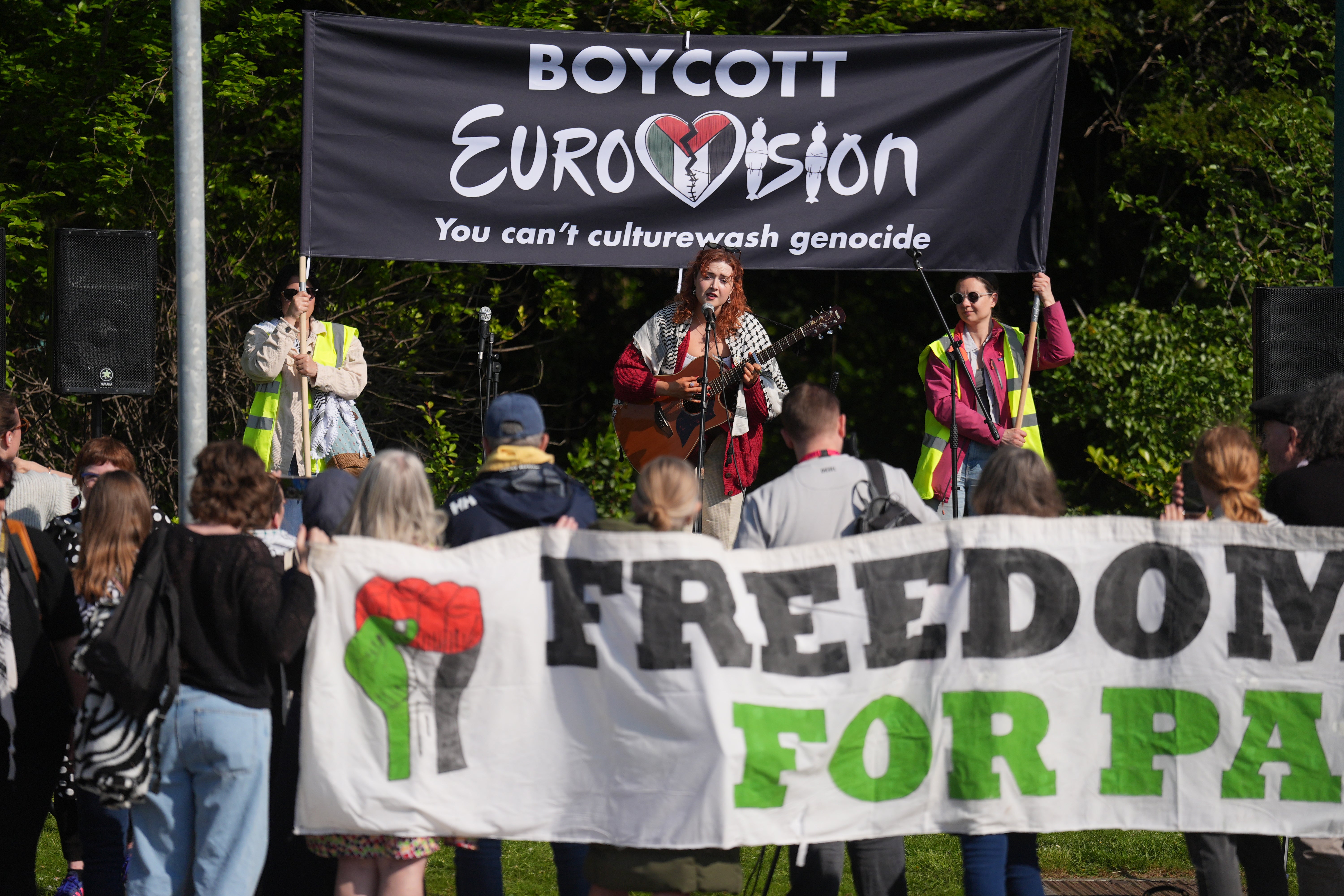 People attend a pro-Palestine mini-concert outside the RTE in Dublin, calling for a boycott of the Eurovision Song Contest