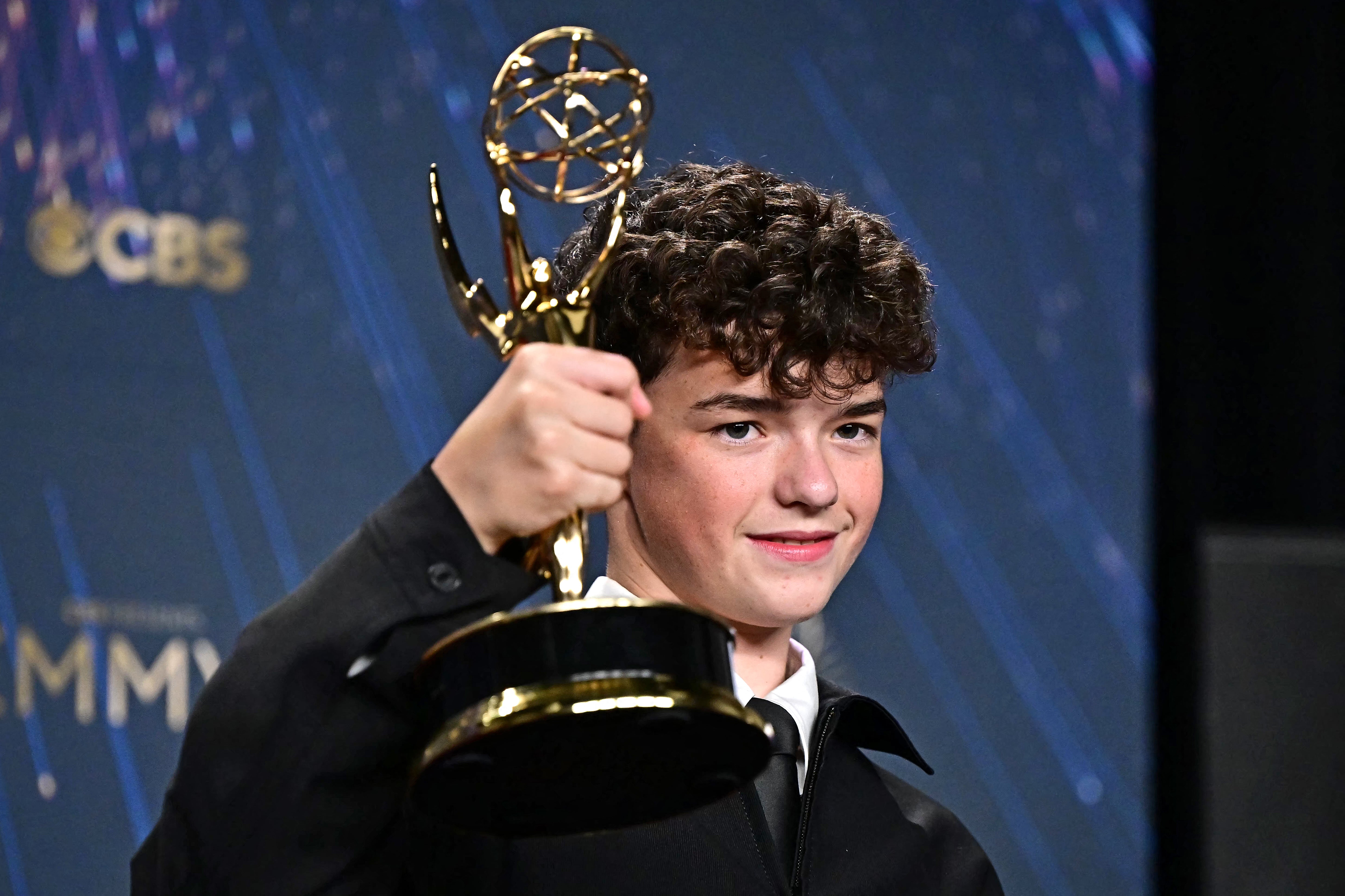 <p>‘Adolescence’ star Owen Cooper with his Emmy Award</p>