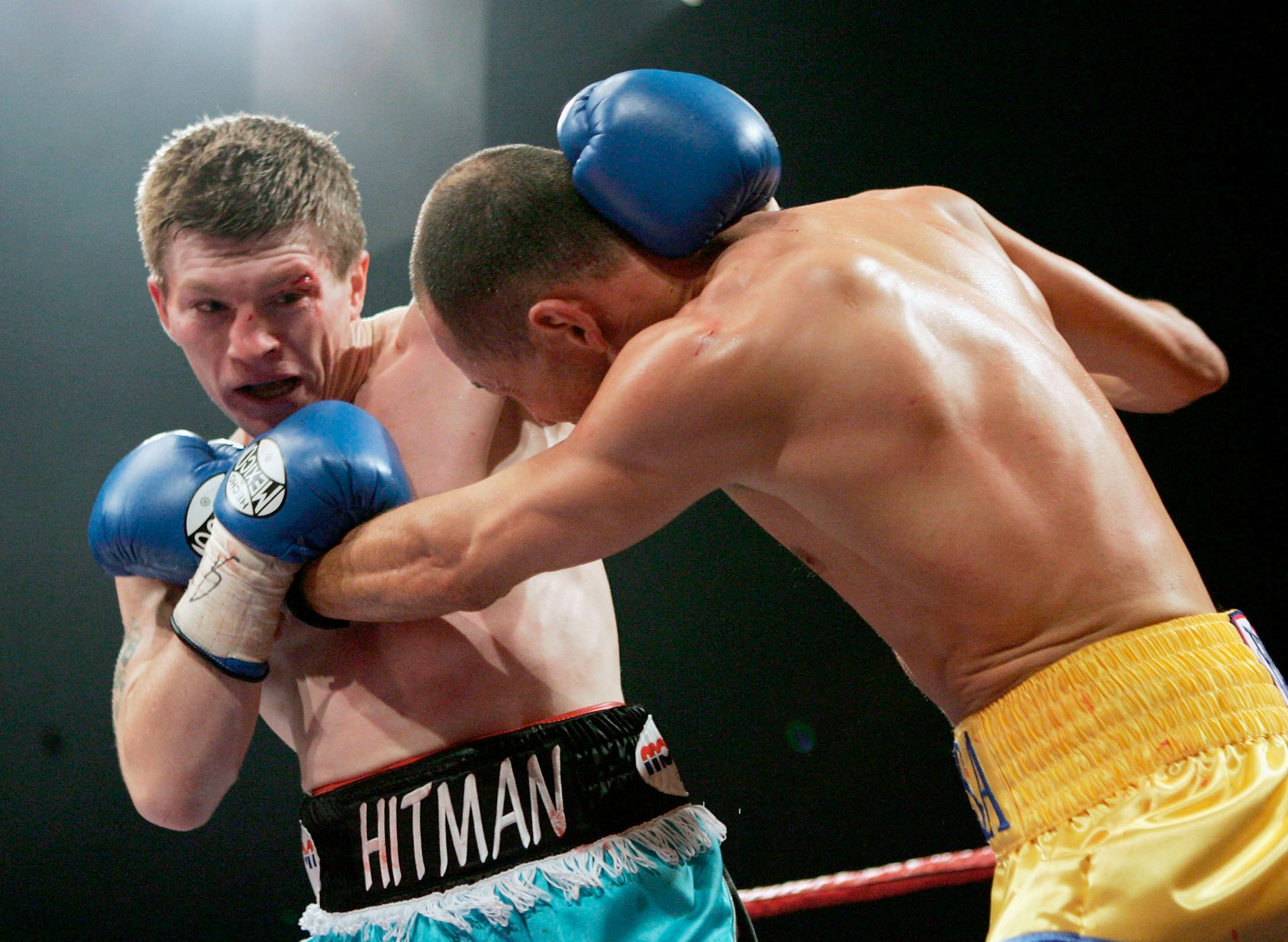 Hatton in action against Carlos Maussa during their unification light Welterweight title fight at the Sheffield Arena in November 2005
