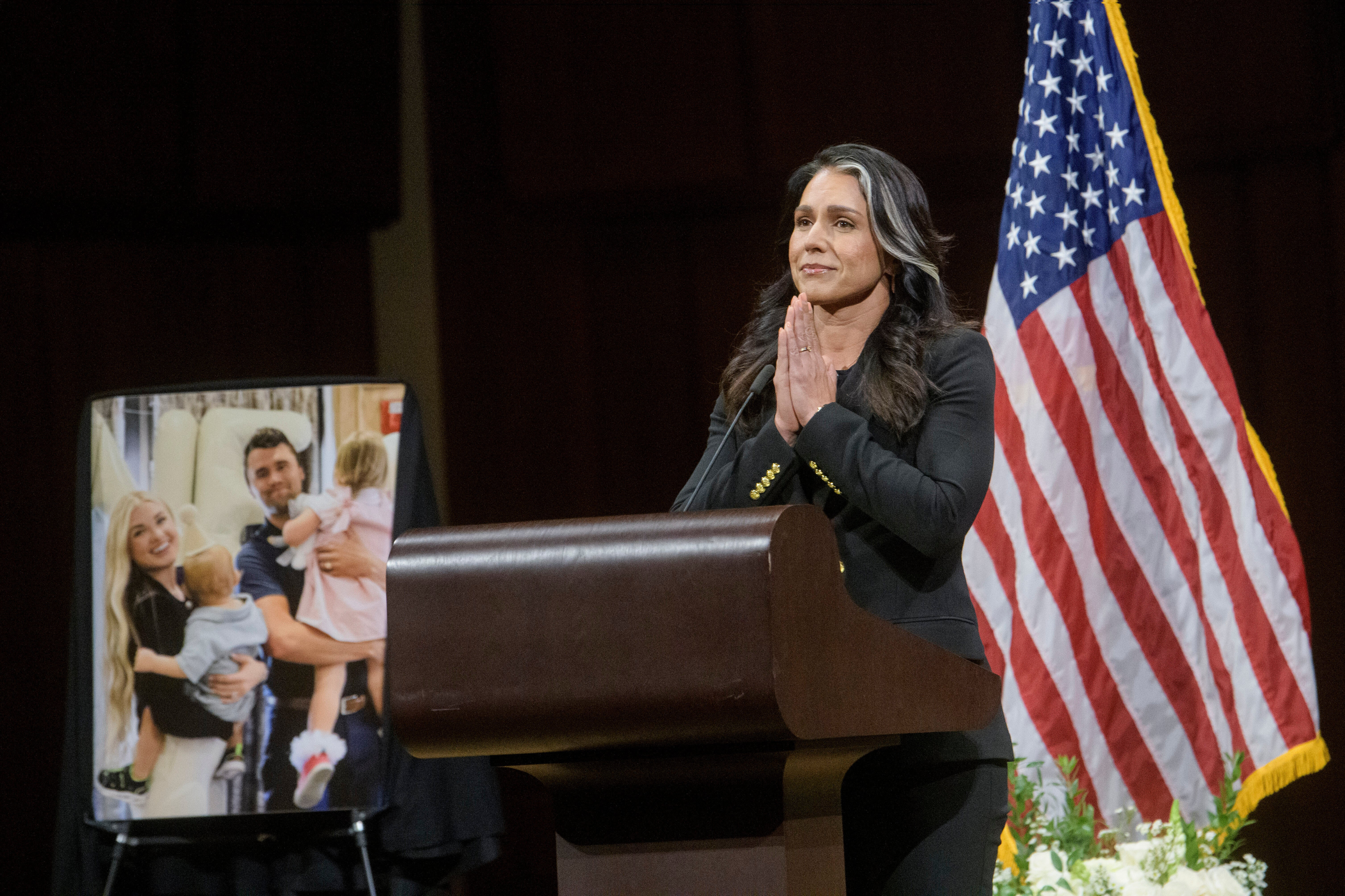 Director of National Intelligence Tulsi Gabbard speaks during a memorial and prayer vigil for Charlie Kirk at the John F. Kennedy Memorial Center for the Performing Arts Sunday