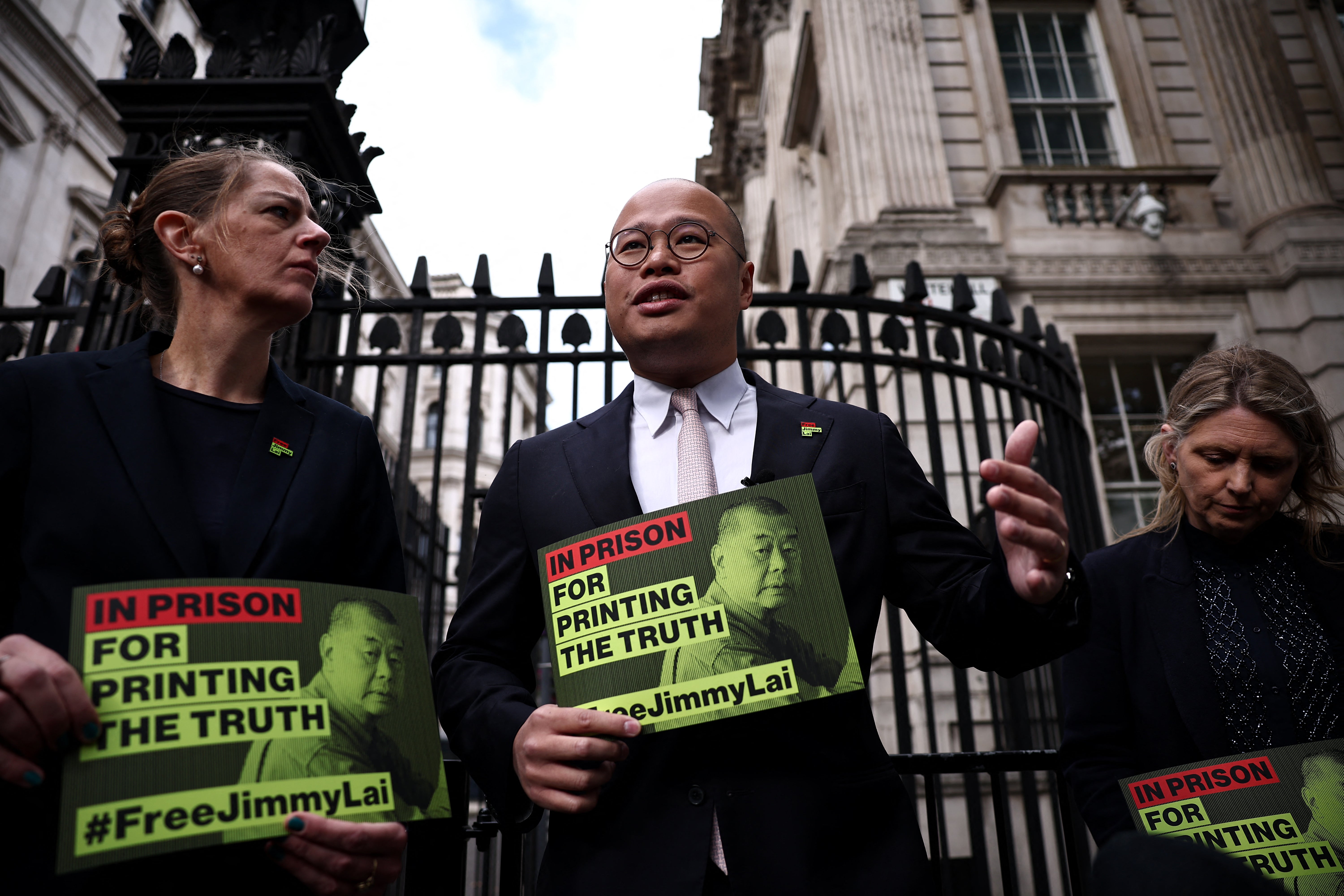 Sebastien Lai, son of Jimmy, speaks during a press conference outside Downing Street in London in September