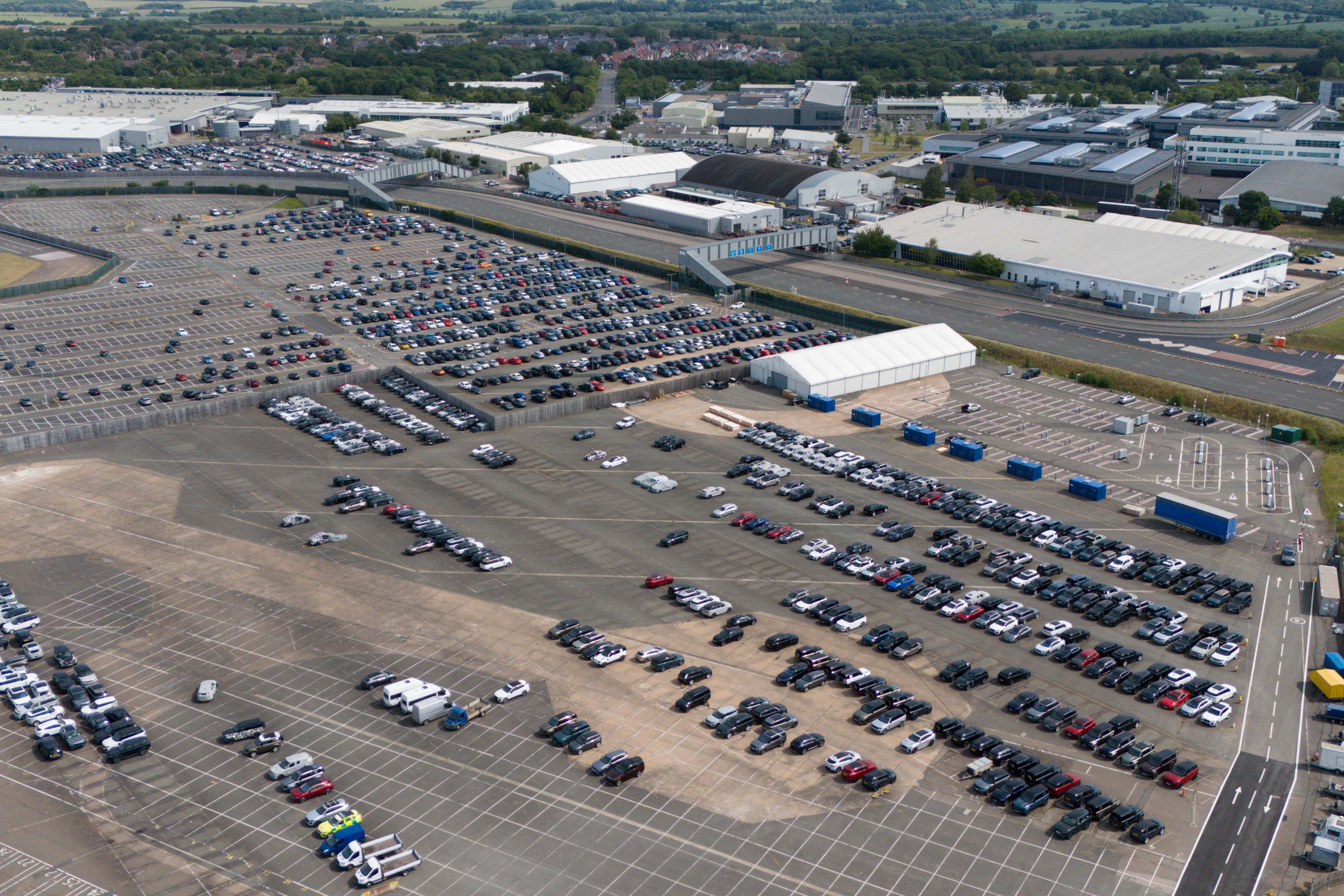 JLR has extended its production pause (Jacob King/PA)