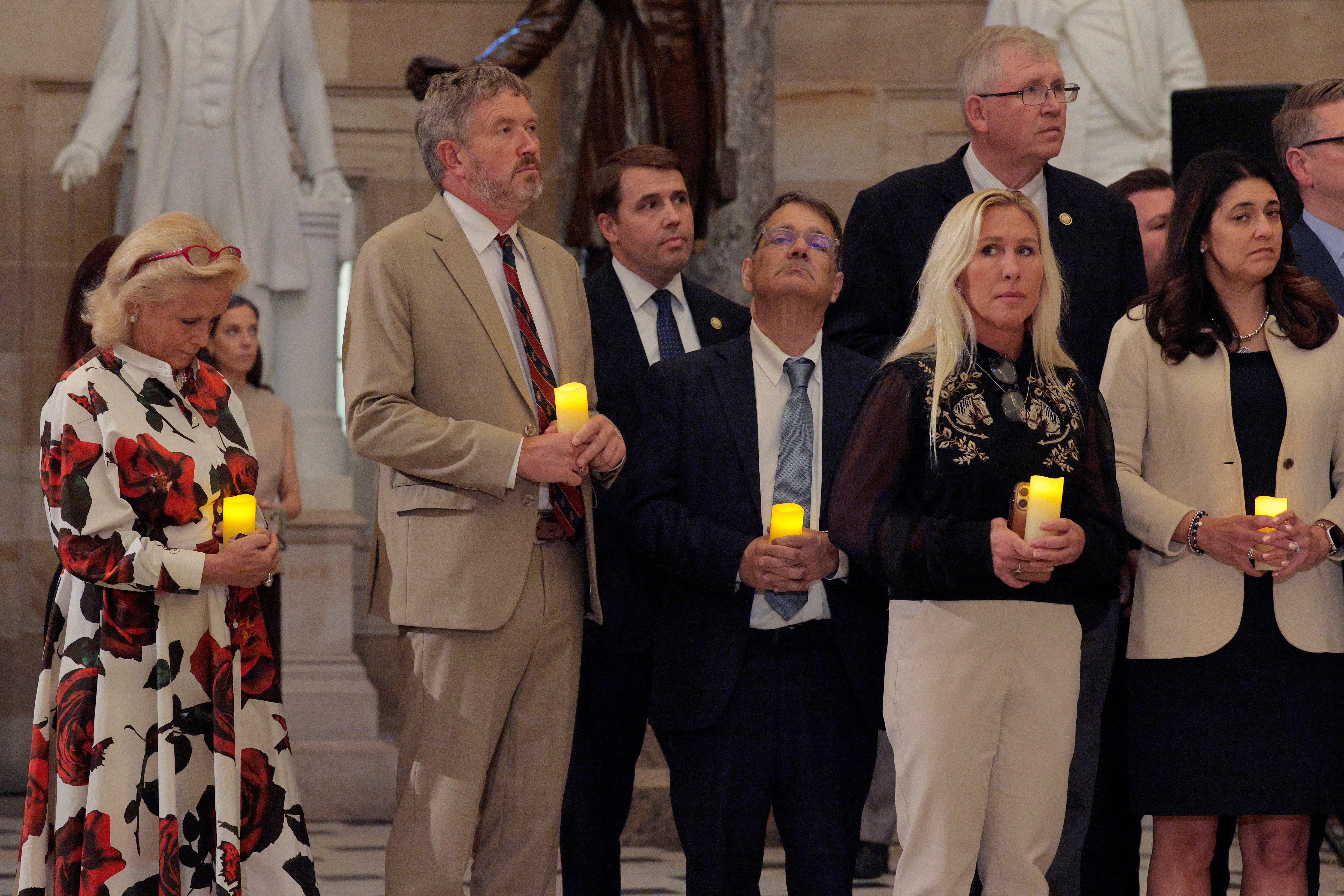 The right-wing Georgia Congresswoman (second from right) said that Republicans now ‘couldn’t be further apart from the left,’ in the aftermath of the fatal incident last week in Utah