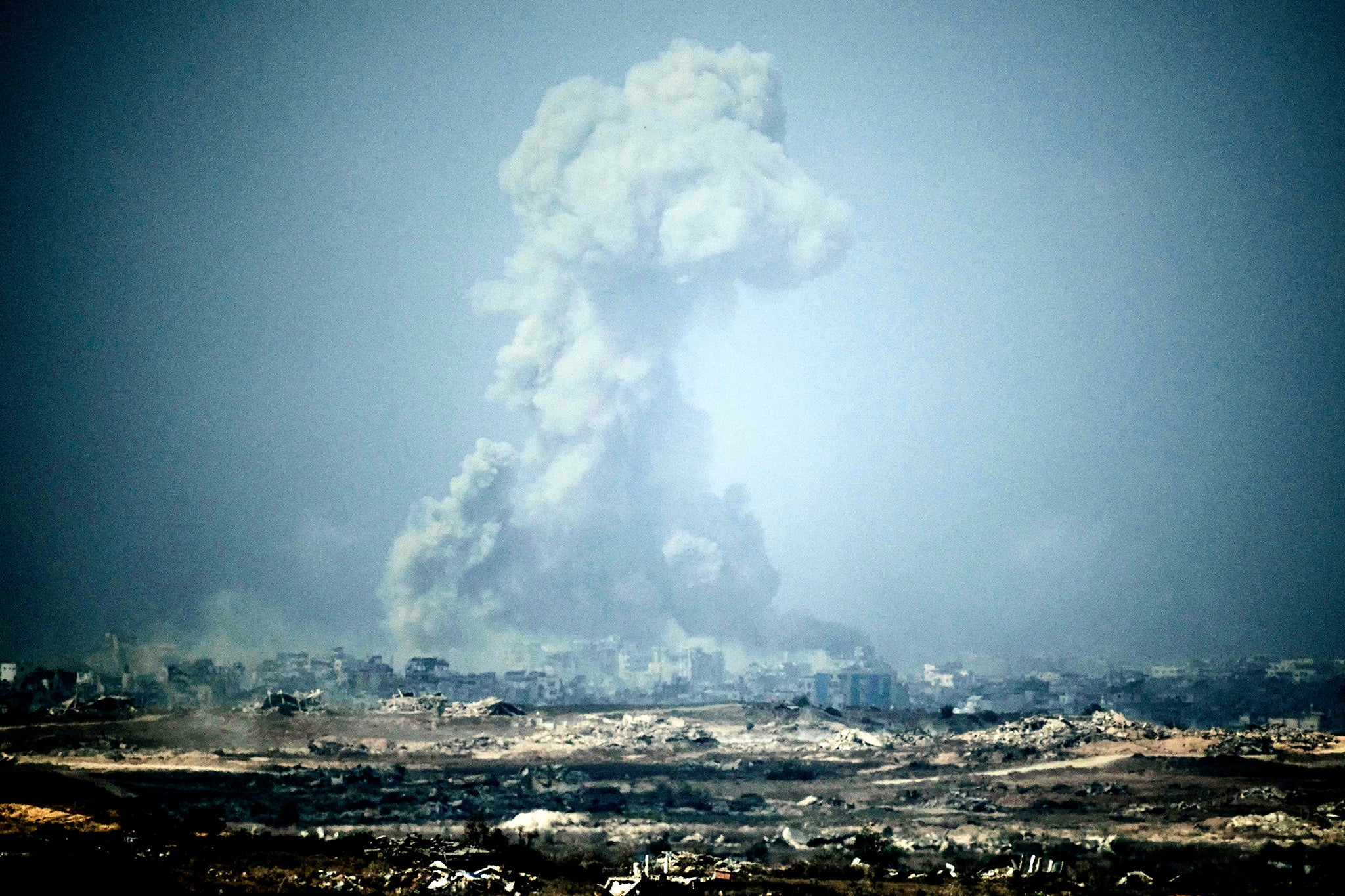 Smoke rises following an Israeli military strike on the Gaza Strip on Tuesday